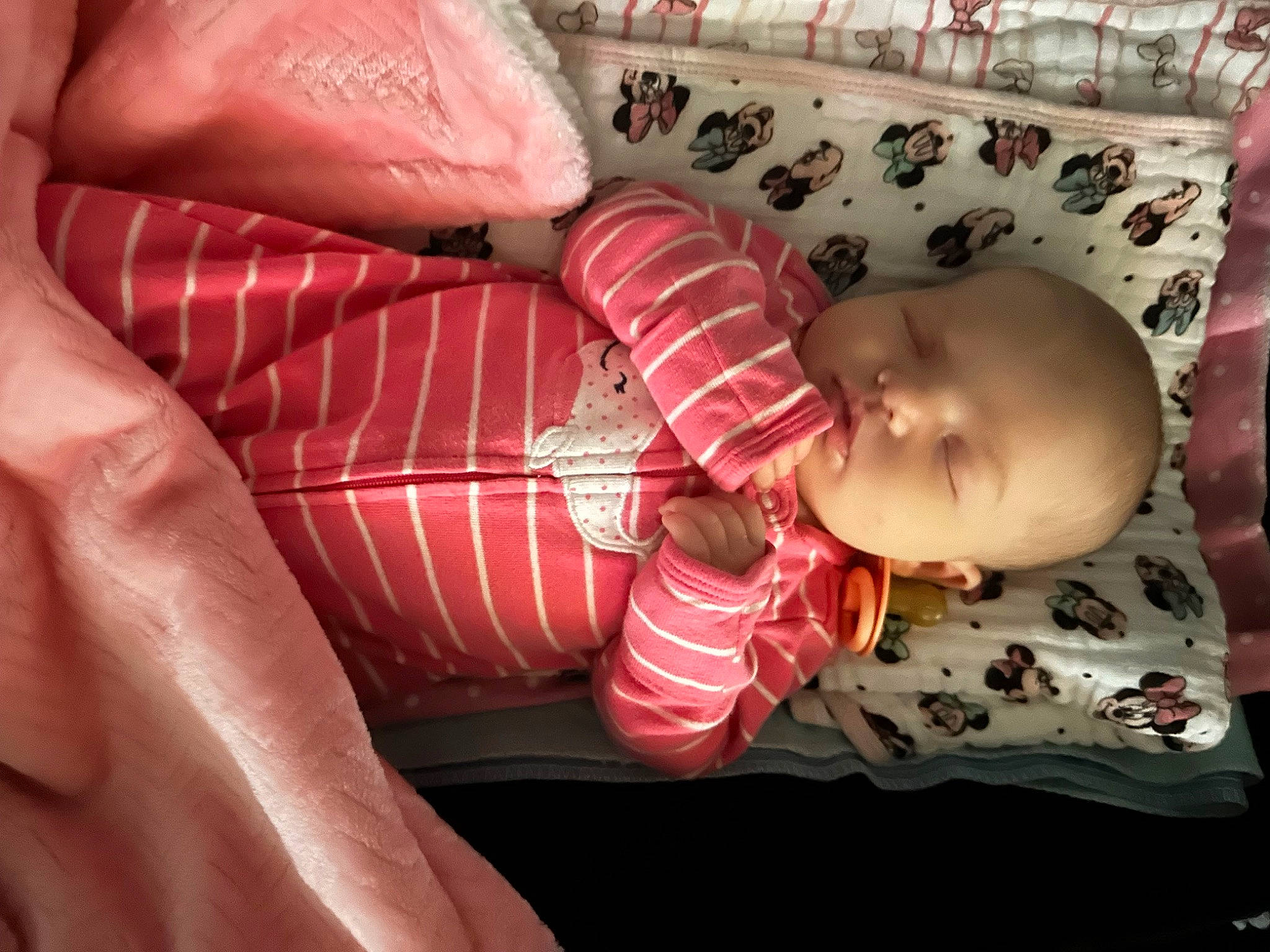 Isabella joined the competition — help win amazing prizes! arm, baby, baby_products, baby_safety, baby_toddler_clothing, bedtime, cheek, child, comfort, finger, infant_bed, linens, mouth, nap, pattern, person, pink, sitting, skin, sleeve
