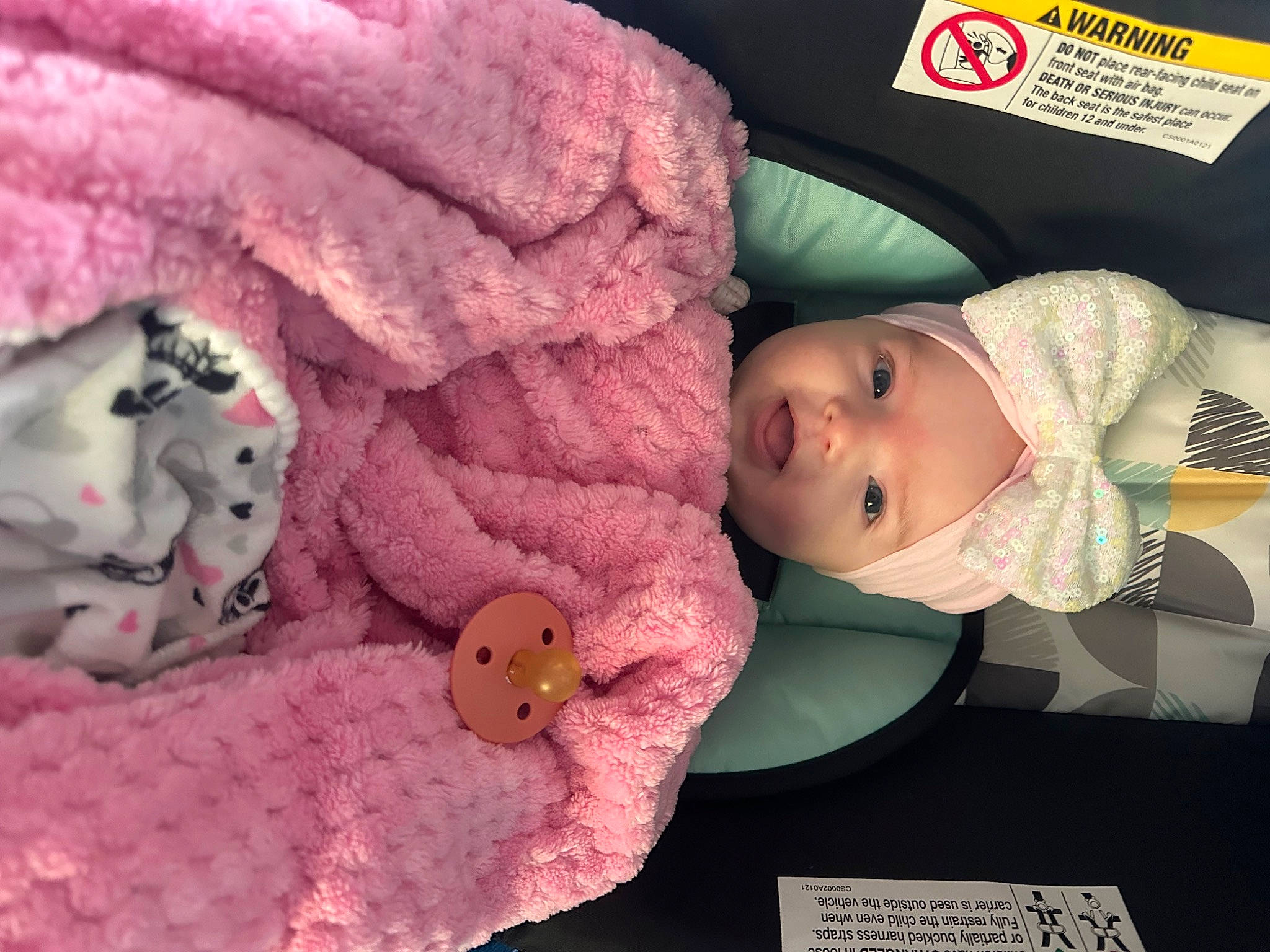Isabella is registered to the contest to win money with this photo: baby, baby_products, baby_toddler_clothing, cheek, child, comfort, eyelash, fur, hat, headgear, linens, lip, magenta, person, pink, product, skin, stuffed_toy, textile, toddler