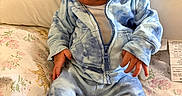 Zahari joined the competition — help win amazing prizes! baby, blanket, blue_clothing, cozy, curious_expression, cushion, face, floral_pattern, hands, hoodie, indoor, infant, newborn, pants, portrait, sitting, socks, soft_fabric, tiger_pattern, young_child