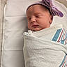 newborn, baby, sleeping, swaddled, hospital, blanket, hat, bow, infant, bed, face, peaceful, cute, resting, portrait, person, closeup, soft, child, indoors