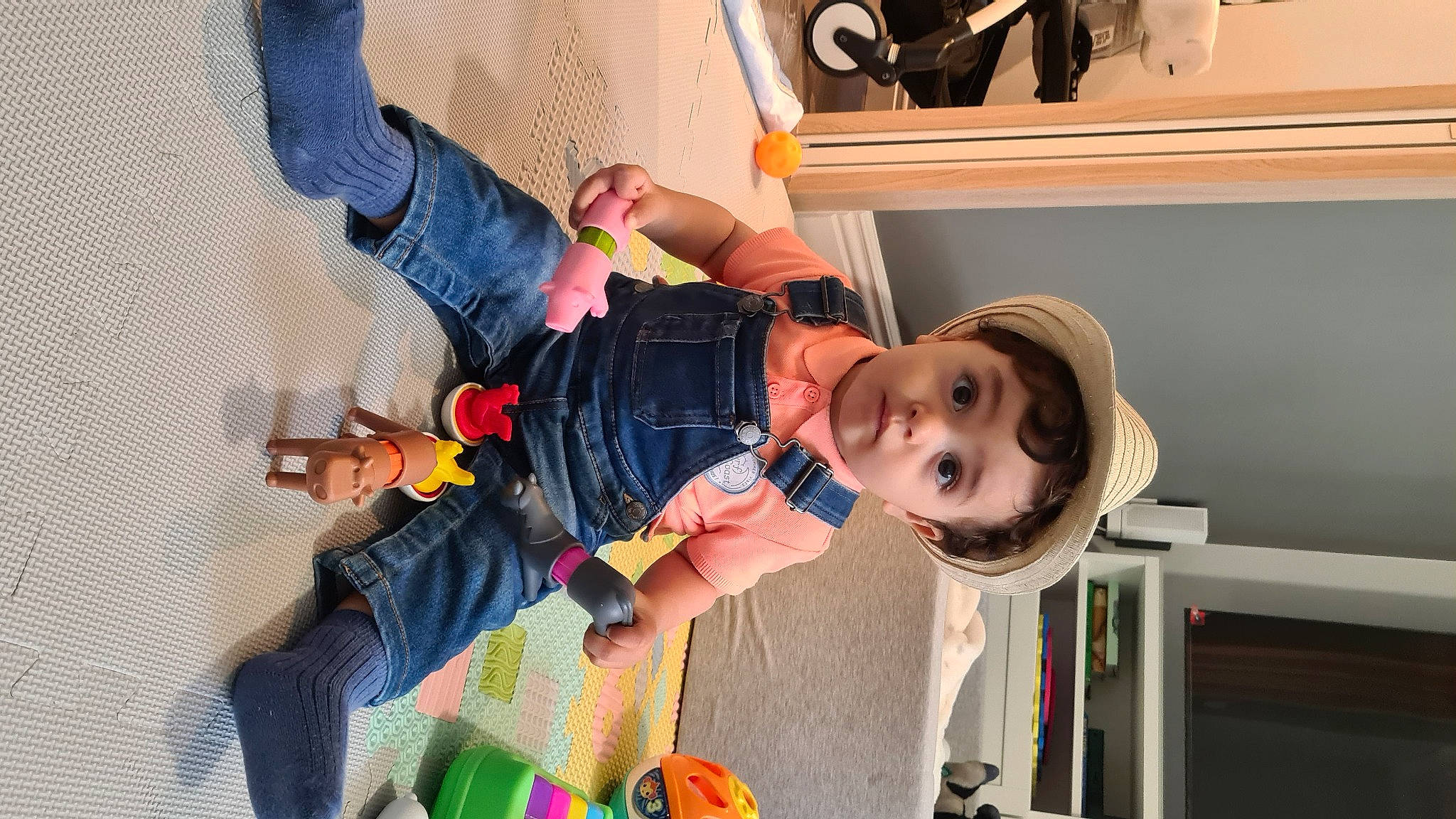 Andrea joined the competition — help win amazing prizes! baby, baby_products, child, fashion_accessory, fun, happy, hat, person, play, room, shelf, smile, sun_hat, toddler, vacation