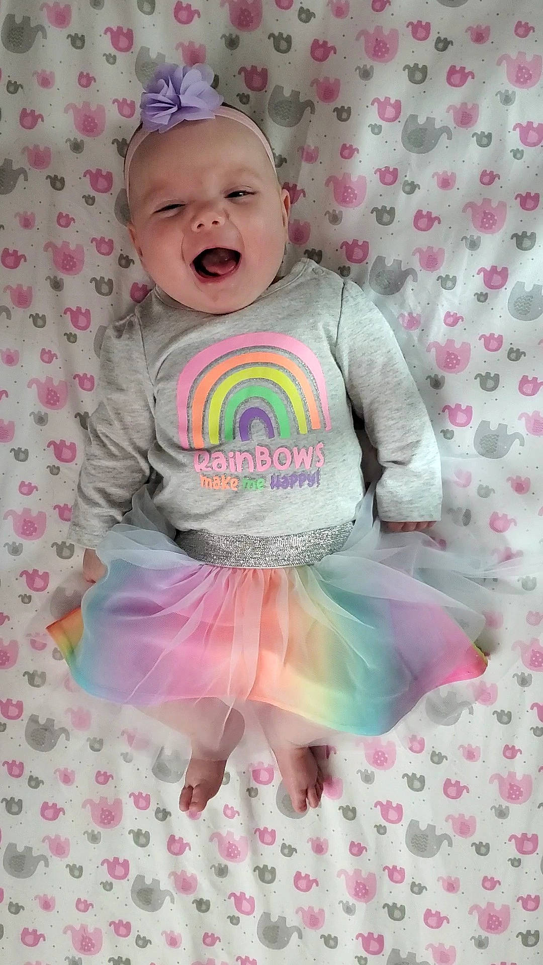 Phoebe is registered to the contest to win money with this photo: baby, baby_products, baby_toddler_clothing, ballet_tutu, child, clothing, costume, hair_accessory, headwear, pattern, person, pink, product, sleeve, smile, toddler