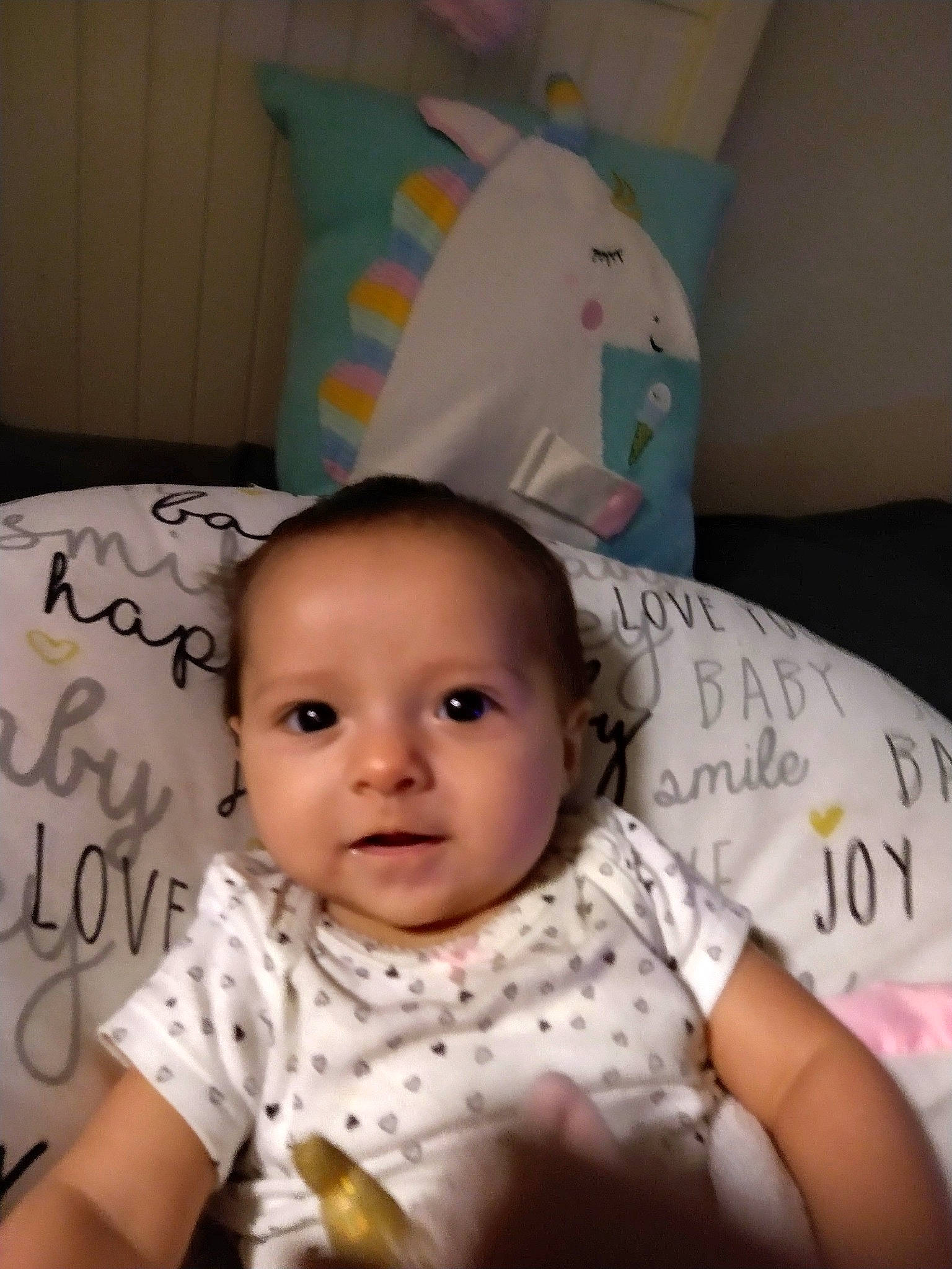 Juniper joined the competition — help win amazing prizes! baby, baby_toddler_clothing, bedding, cheek, child, comfort, eyebrow, happy, iris, linens, mammal, mouth, nose, pattern, person, sitting, skin, sleeve, smile, t_shirt