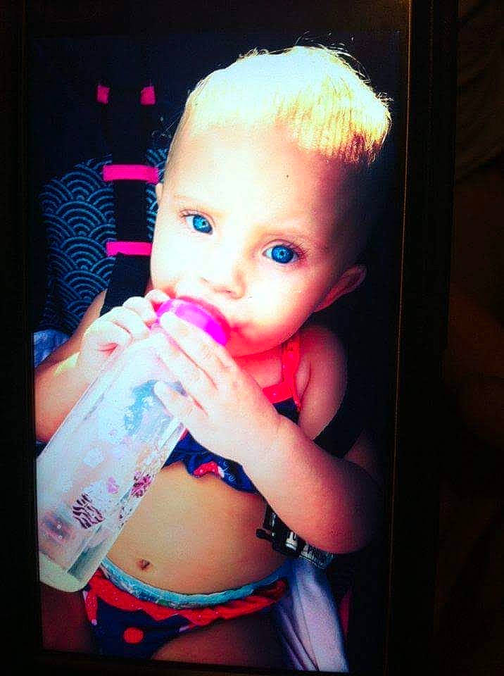 Lila is registered to the contest to win money with this photo: abdomen, baby, baby_toddler_clothing, blond, cheek, chest, child, eyelash, flash_photography, happy, lip, magenta, nail, navel, person, pink, portrait_photography, purple, sweetness, toddler