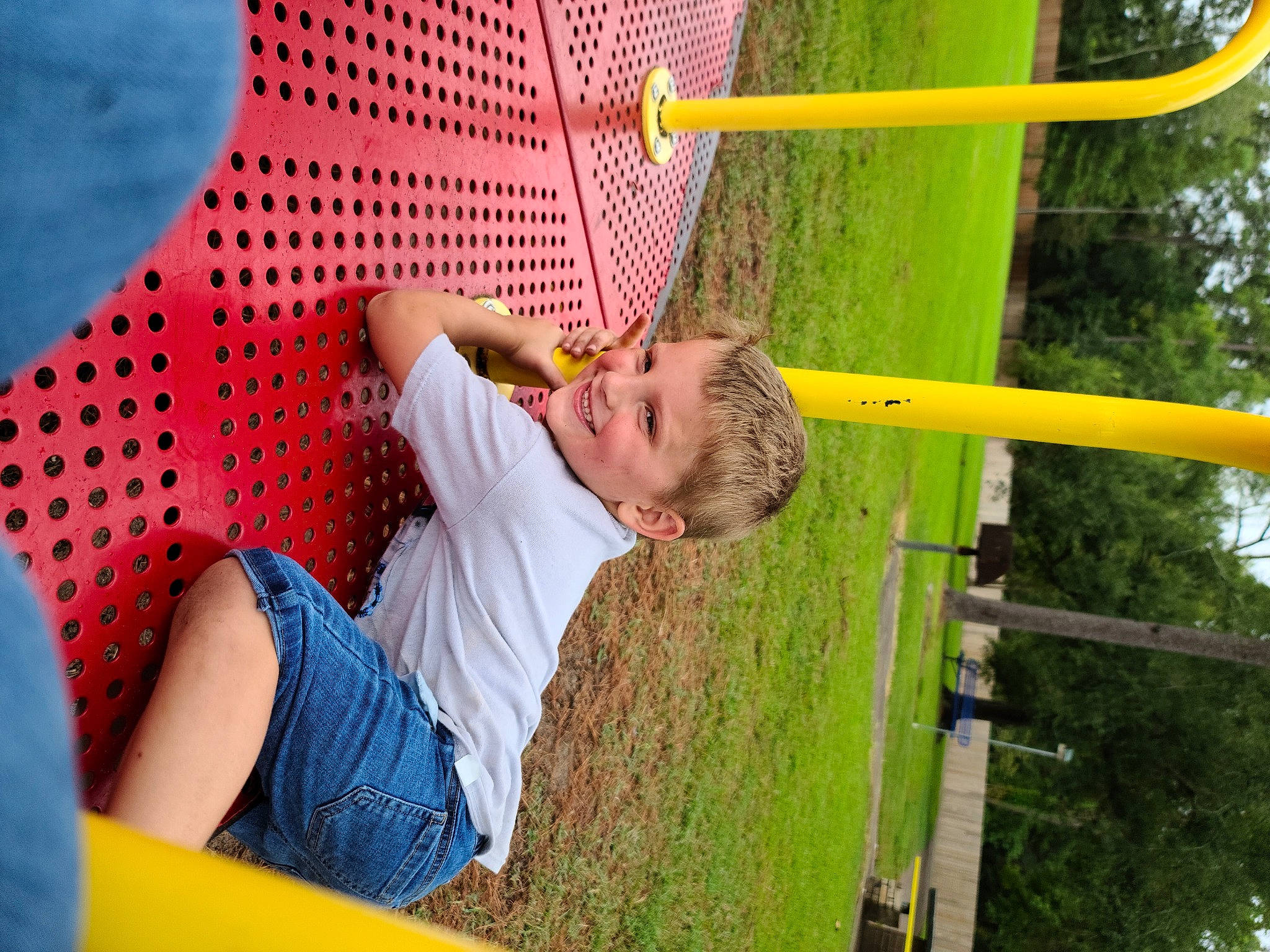 Sanford joined the competition — help win amazing prizes! blue, child, city, comfort, fun, grass, green, happy, human_leg, joy, leisure, outdoor_play_equipment, pattern, people_in_nature, person, plant, playground, recreation, sitting, t_shirt