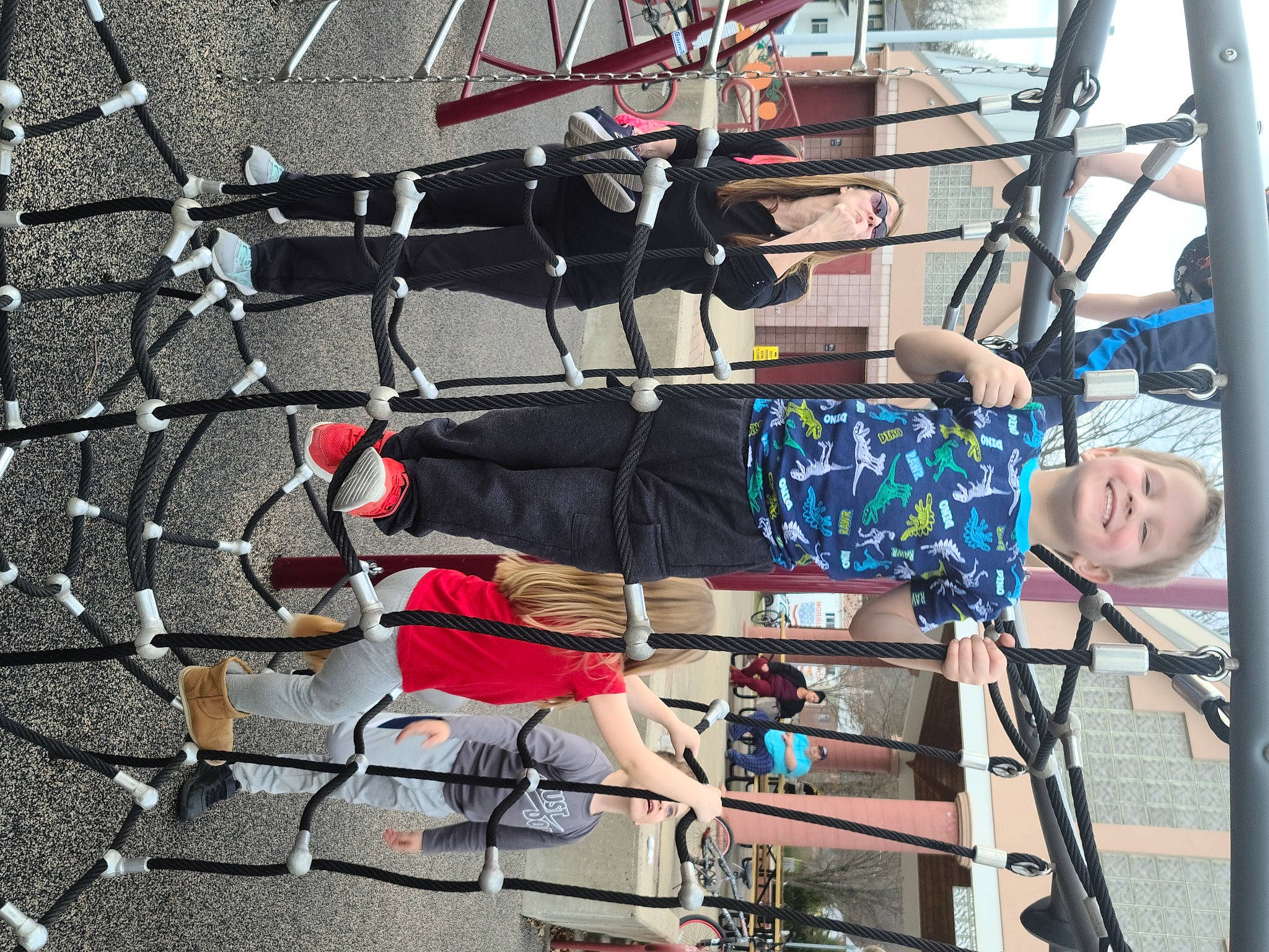 Sanford is registered to the contest to win money with this photo: auto_part, automotive_tire, bicycle_tire, bicycle_wheel, carmine, chain_link_fencing, footwear, joy, leg, mesh, metal, microphone, musical_instrument, net, person, recreation, shoe, sidewalk, sneakers, tire