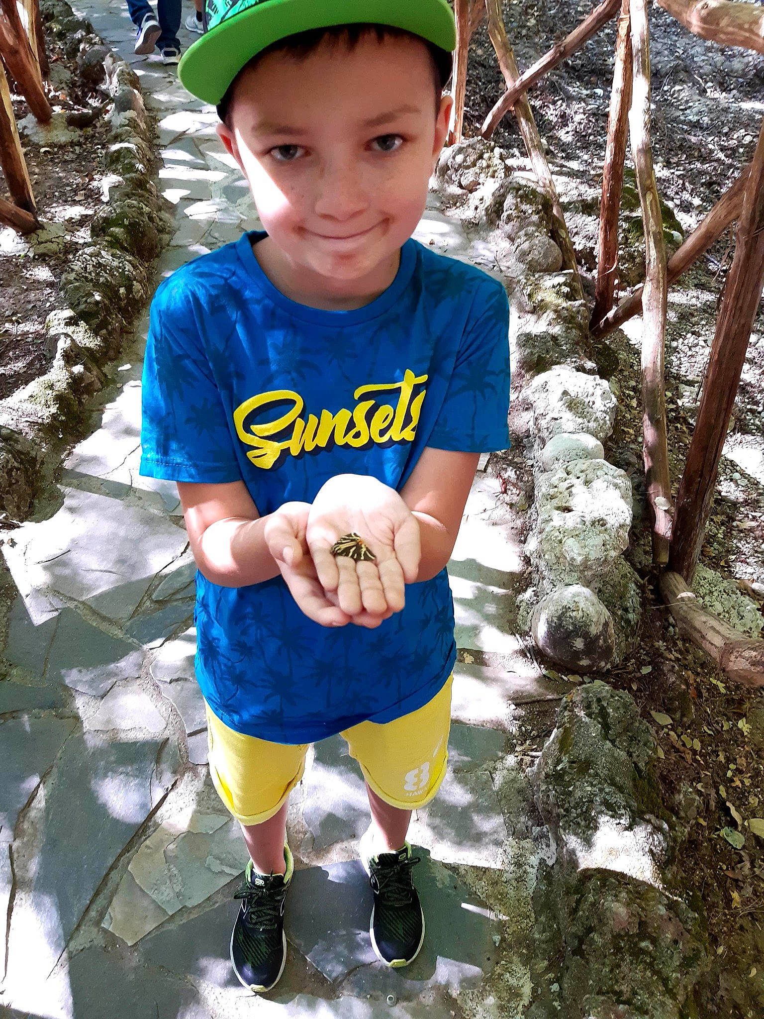 Noah participe au concours pour gagner de l'argent avec cette photo : baby_toddler_clothing, cap, child, clothing, cool, electric_blue, face, fun, happy, headwear, joy, leaf, leisure, people, person, recreation, shorts, sleeve, smile, snapshot