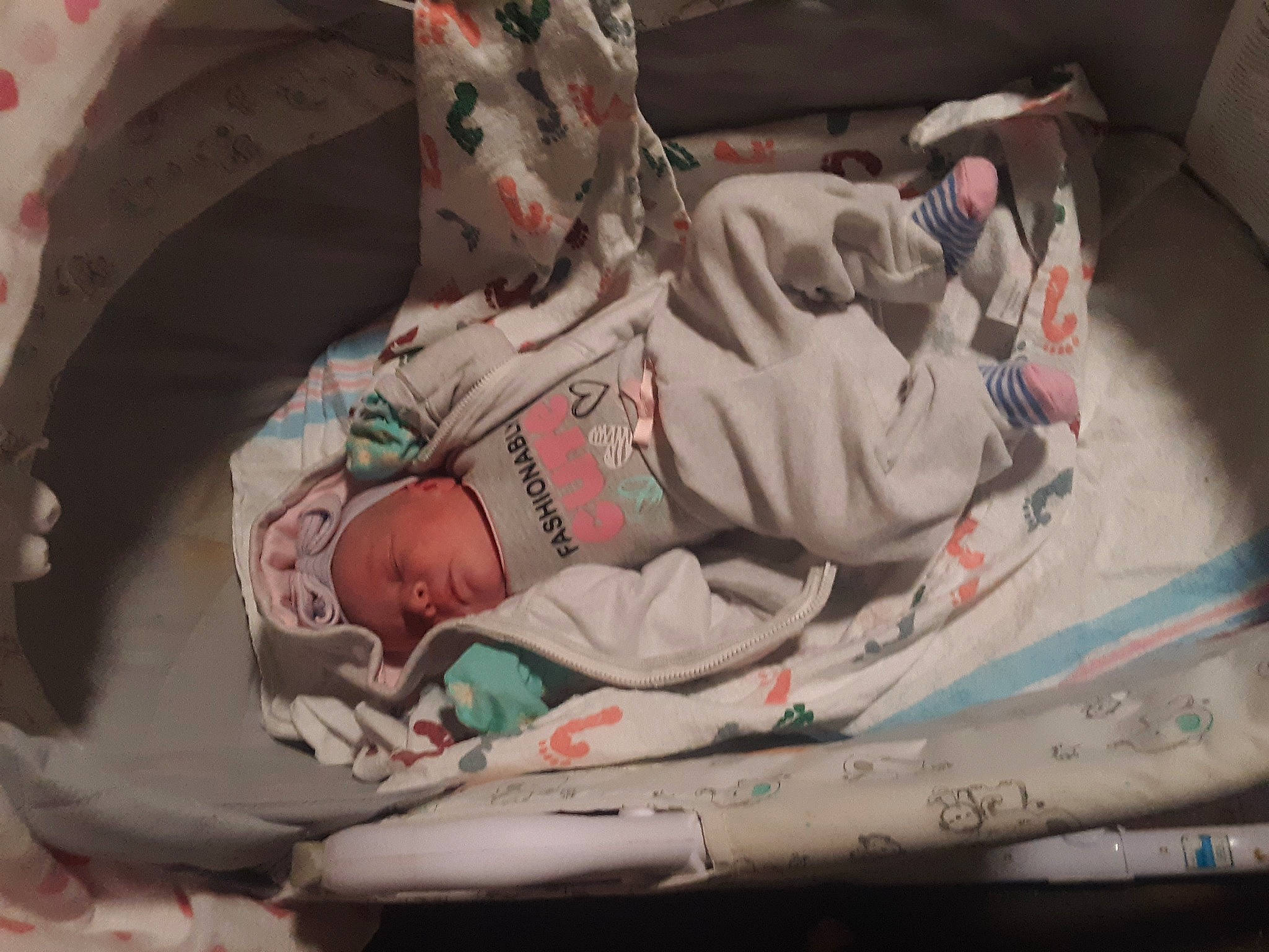 Riverlynn is registered to the contest to win money with this photo: art, baby, baby_products, baby_safety, bed_sheet, bedding, bedtime, blanket, carmine, child, comfort, flesh, infant_bed, linens, packing_materials, pattern, person, room, sleep, toddler