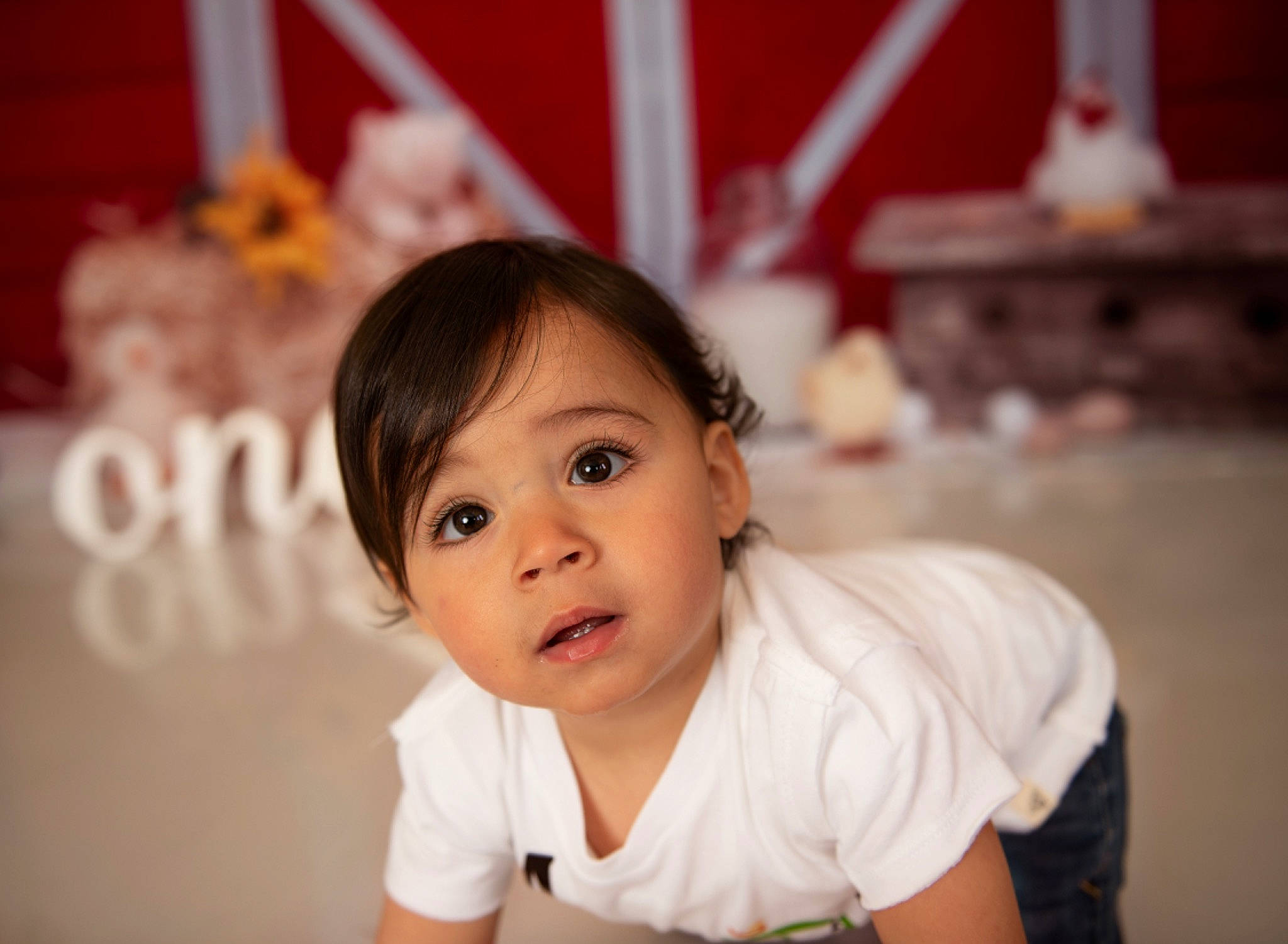 Aj is registered to the contest to win money with this photo: baby, baby_toddler_clothing, cheek, child, ear, eyelash, flash_photography, fun, happy, iris, leisure, nose, person, portrait_photography, room, sitting, skin, surprise, sweetness, t_shirt