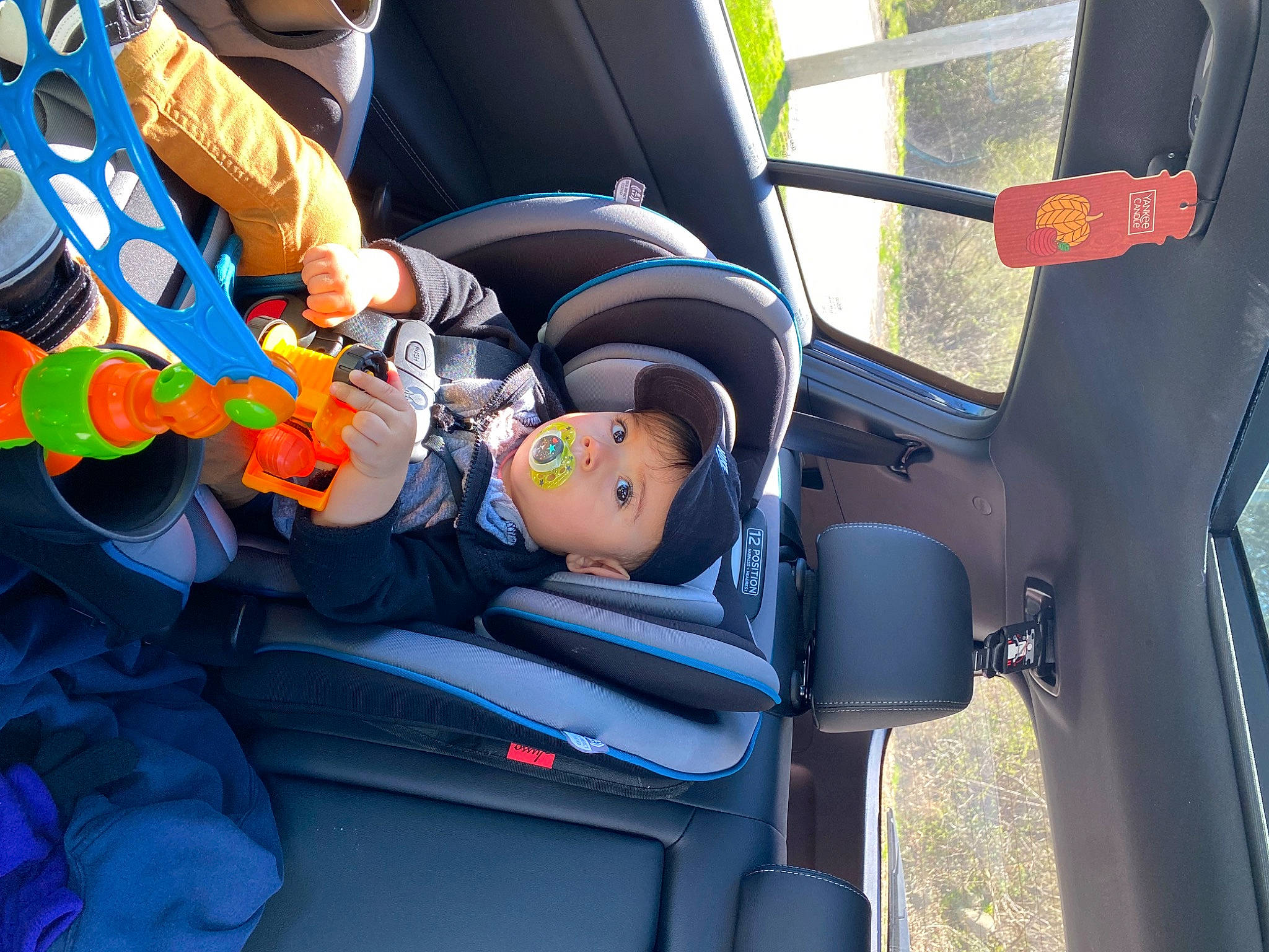 Aj joined the competition — help win amazing prizes! air_travel, auto_part, automotive_design, automotive_exterior, baby_products, car_seat, car_seat_cover, child, electric_blue, family_car, fun, head_restraint, leisure, mode_of_transport, motor_vehicle, passenger, person, seat_belt, toddler, vehicle