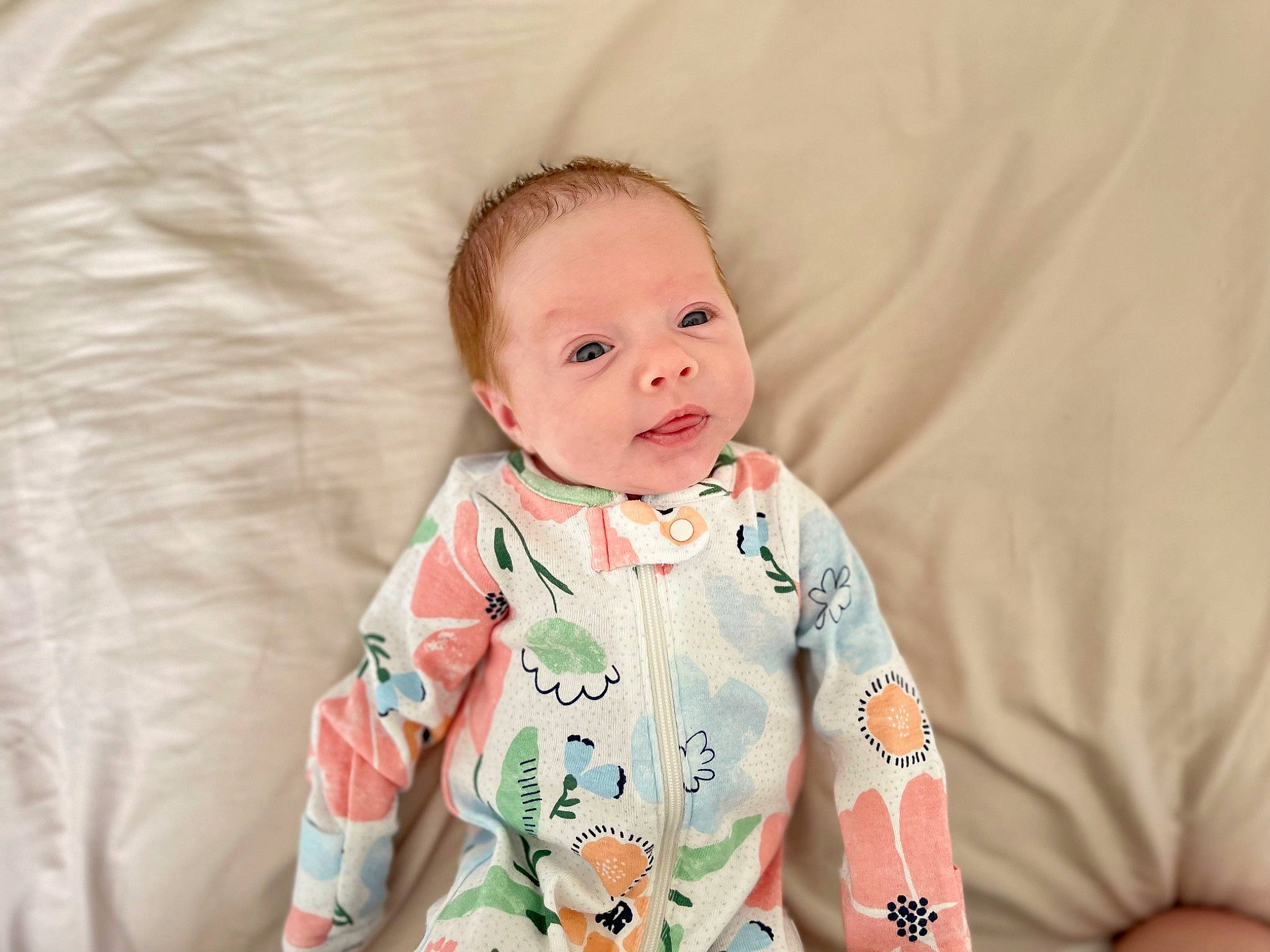 Emersyn is registered to the contest to win money with this photo: baby, baby_toddler_clothing, cheek, child, collar, comfort, dress, eye, face, fun, happy, linens, pattern, peach, person, portrait_photography, sitting, skin, sleeve, t_shirt