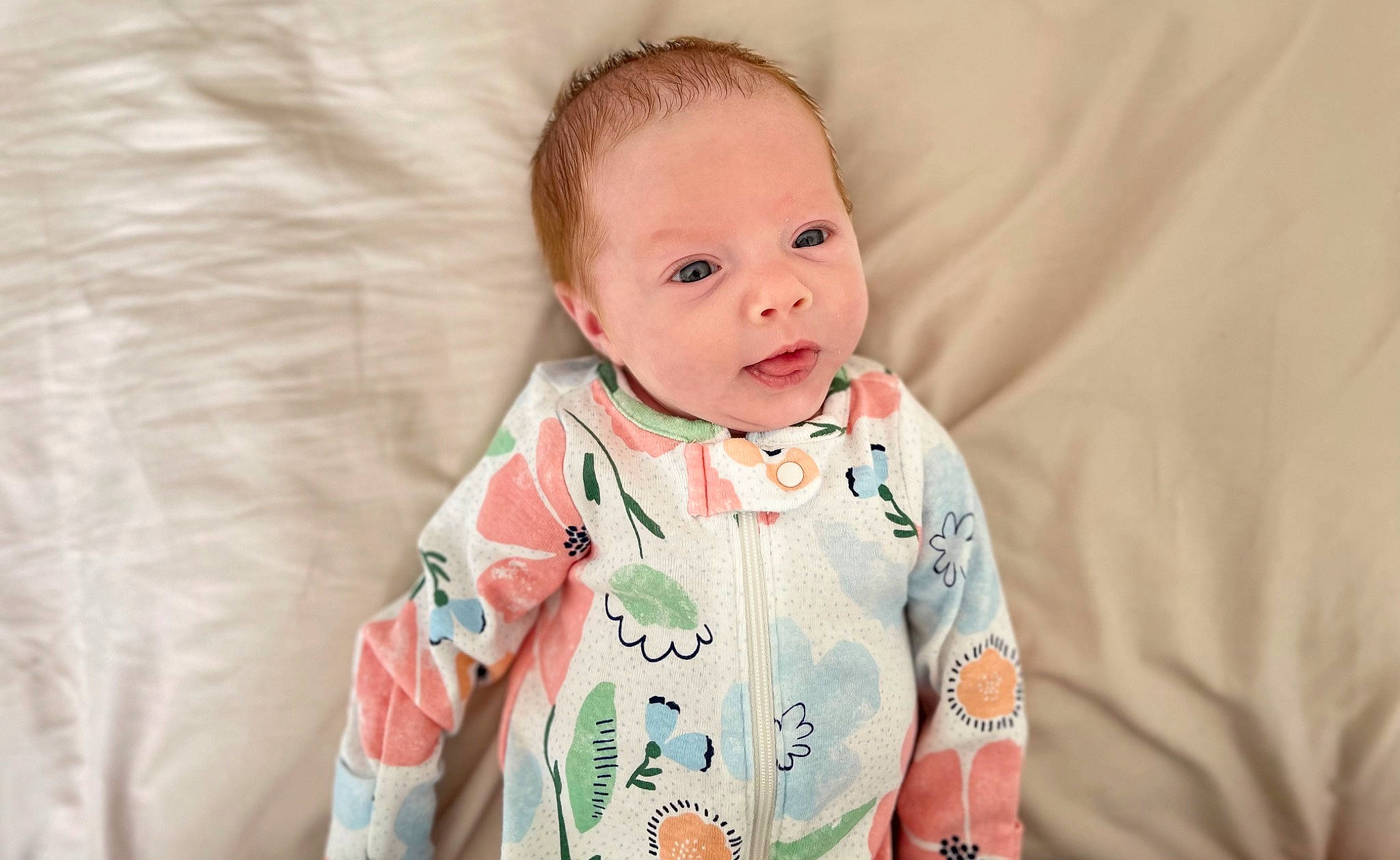 Emersyn is registered to the contest to win money with this photo: arm, baby, baby_toddler_clothing, cheek, child, chin, collar, comfort, dress, face, happy, head, iris, lip, nose, person, skin, sleeve, t_shirt, textile