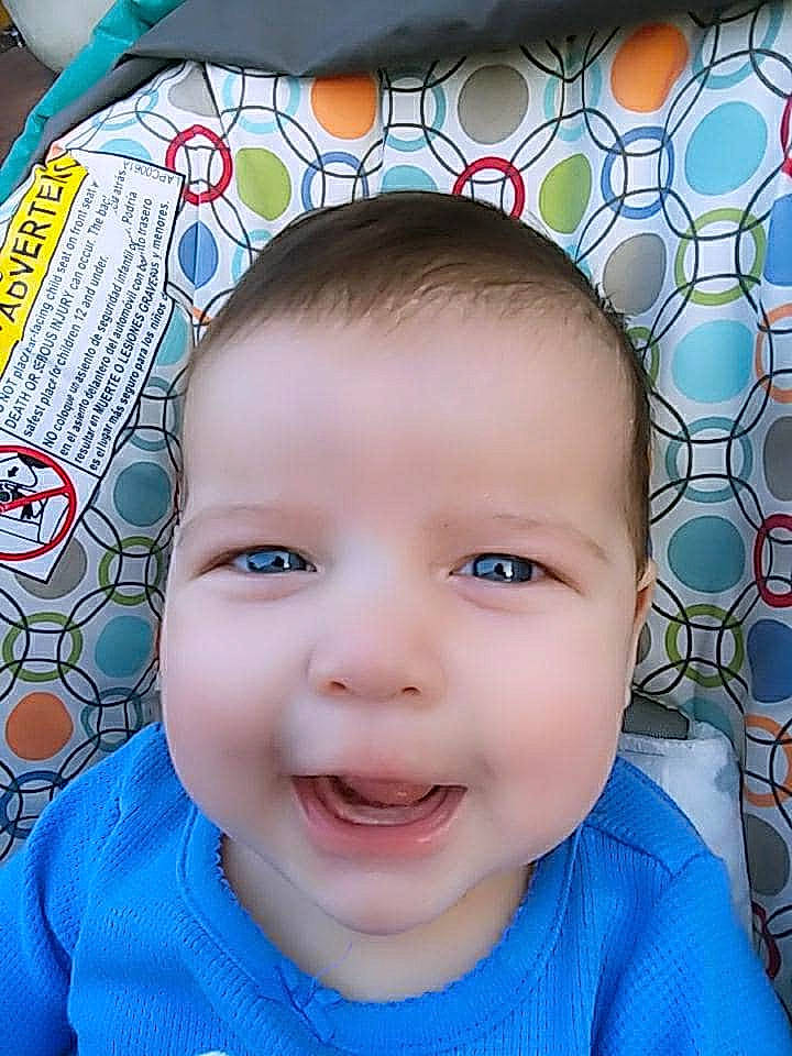 Skylar is registered to the contest to win money with this photo: baby, baby_making_funny_faces, blue, cheek, child, chin, eye, face, facial_expression, forehead, head, lip, mouth, nose, person, skin, smile, toddler