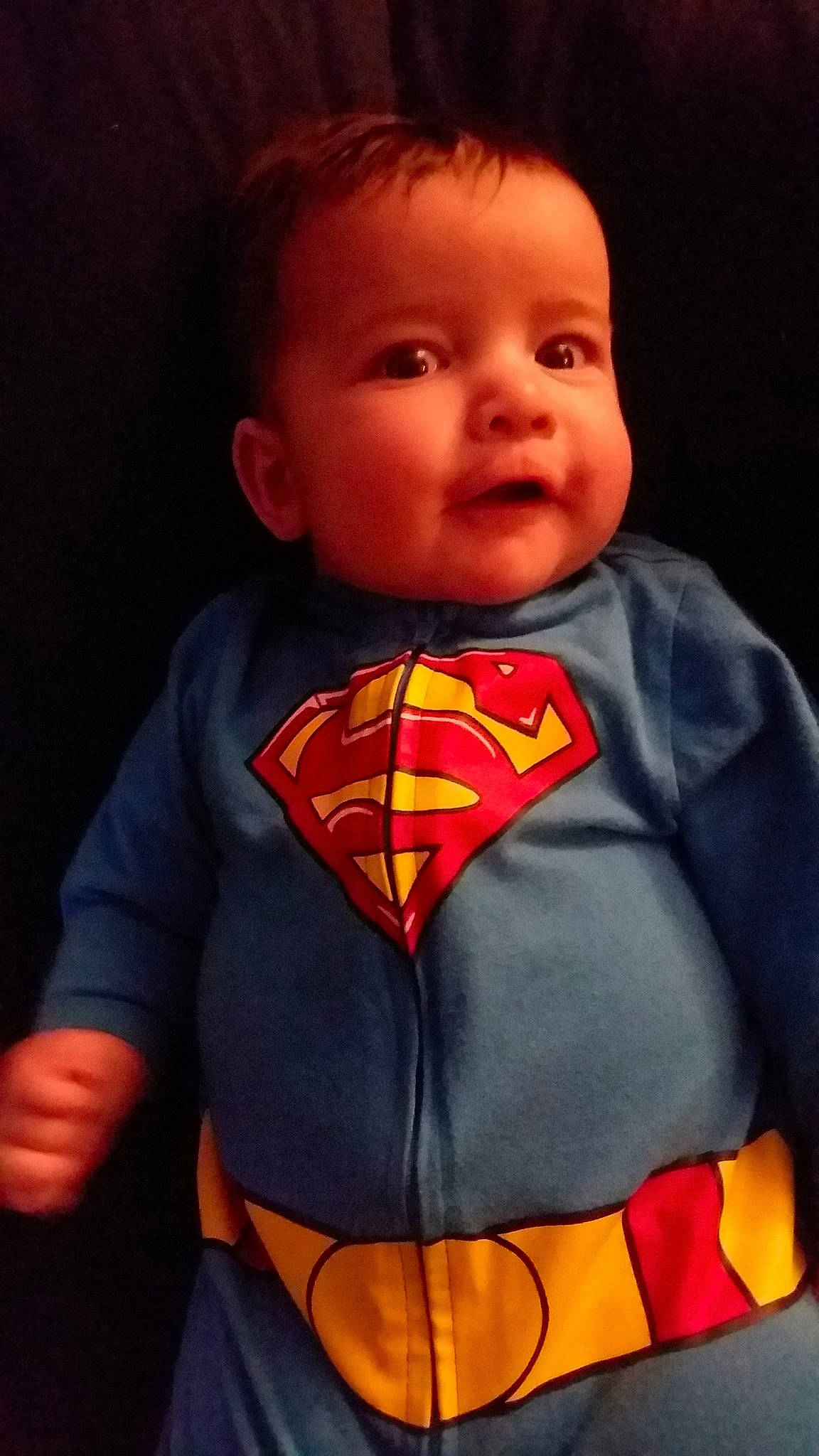 Skylar is registered to the contest to win money with this photo: baby, cheek, child, fictional_character, forehead, head, hero, justice_league, lip, mouth, person, skin, smile, superhero, superman, toddler