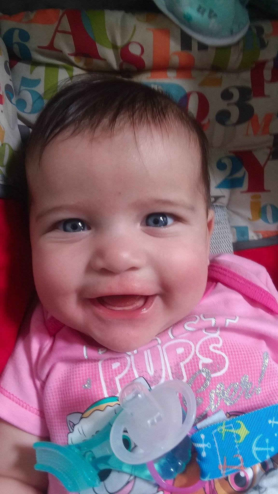 Skylar is registered to the contest to win money with this photo: baby, beauty, cheek, child, chin, close_up, eye, eyebrow, face, facial_expression, forehead, head, iris, lip, mouth, nose, person, pink, skin, smile