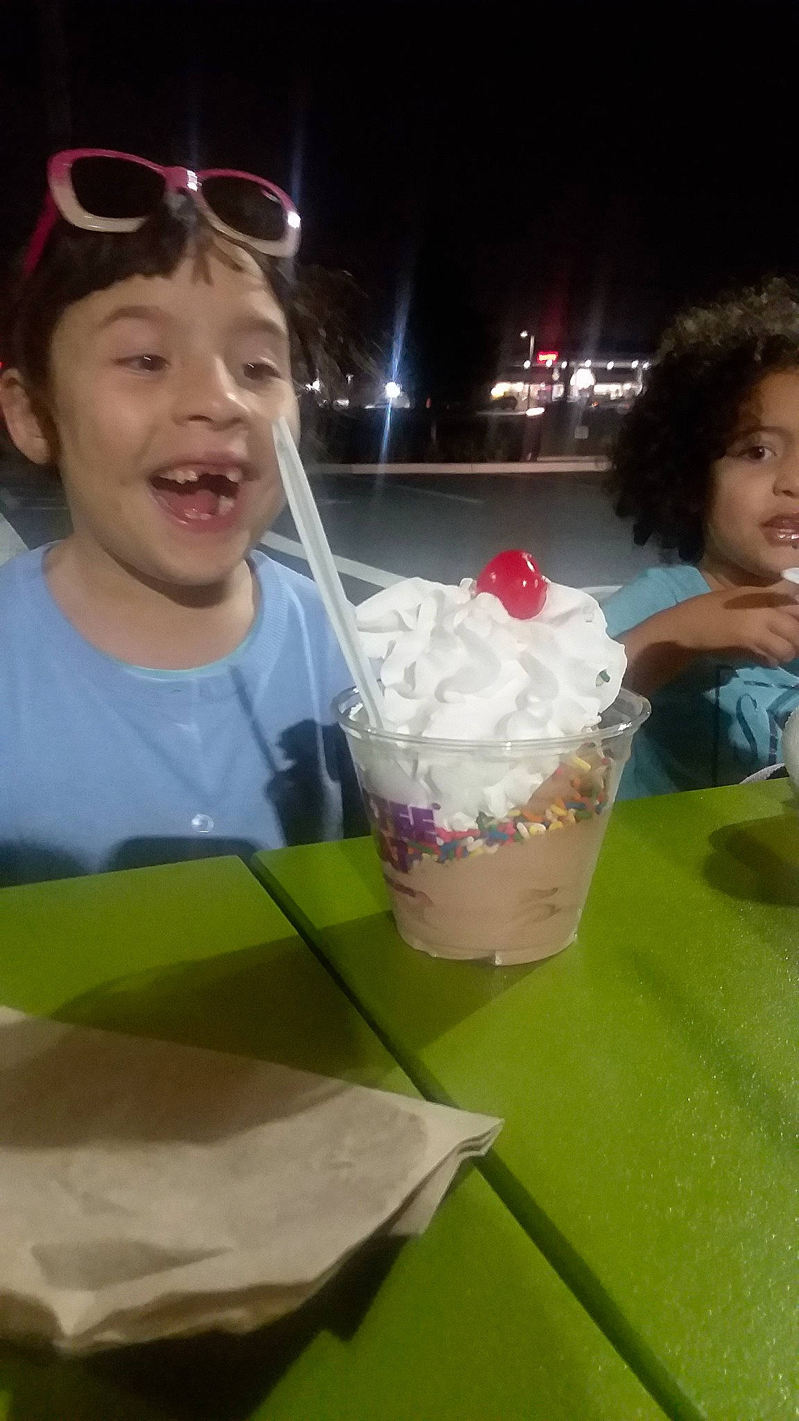 Isabella is registered to the contest to win money with this photo: child, cream, cuisine, dairy, dessert, eating, food, frozen_dessert, fun, gelato, ice_cream, person, sundae, sweetness, toddler, whipped_cream