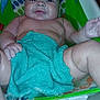 baby, bath, water, towel, blue, seat, bubbles, skin, face, child, infant, wet, smile, foam, plastic, care_label, indoor, relaxing, cute, sitting