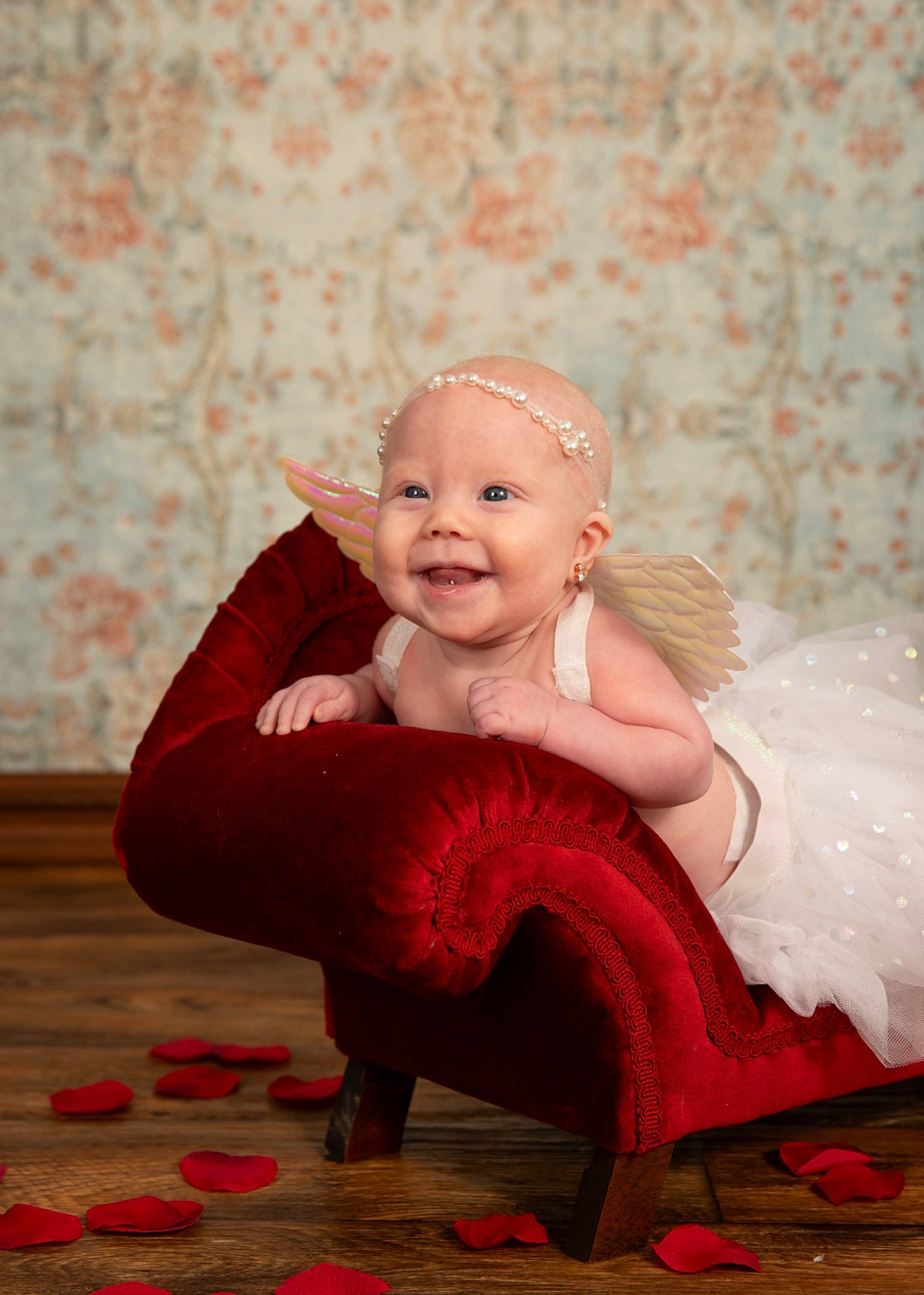 Georgia is registered to the contest to win money with this photo: baby, baby_toddler_clothing, dress, embellishment, event, eye, face, flash_photography, flooring, happy, headband, headgear, headpiece, human_body, jewellery, joy, magenta, person, pink, smile
