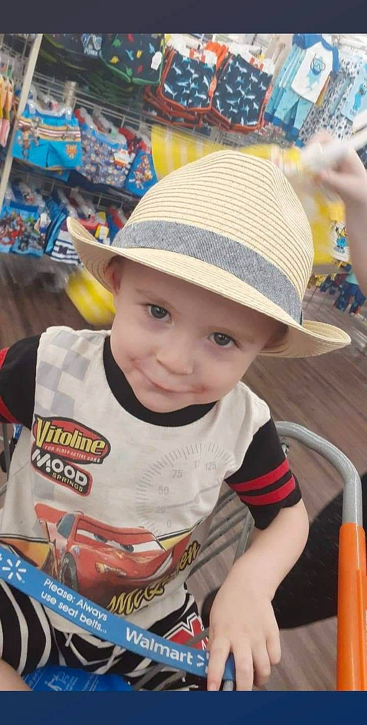 Micheal is registered to the contest to win money with this photo: cap, child, cowboy_hat, fashion_accessory, hat, headgear, headwear, joy, person, play, product, sun_hat, toddler