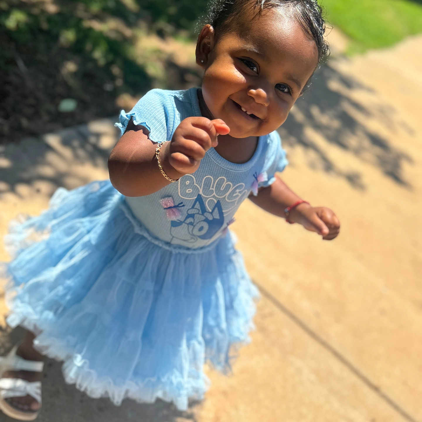 Za Myra joined the competition — help win amazing prizes! blue_dress, bracelet, child, cute, footwear, grass, happy, nature, outdoor, person, playful, portrait, shadow, short_hair, sidewalk, smiling, summer, sunlight, toddler, walking