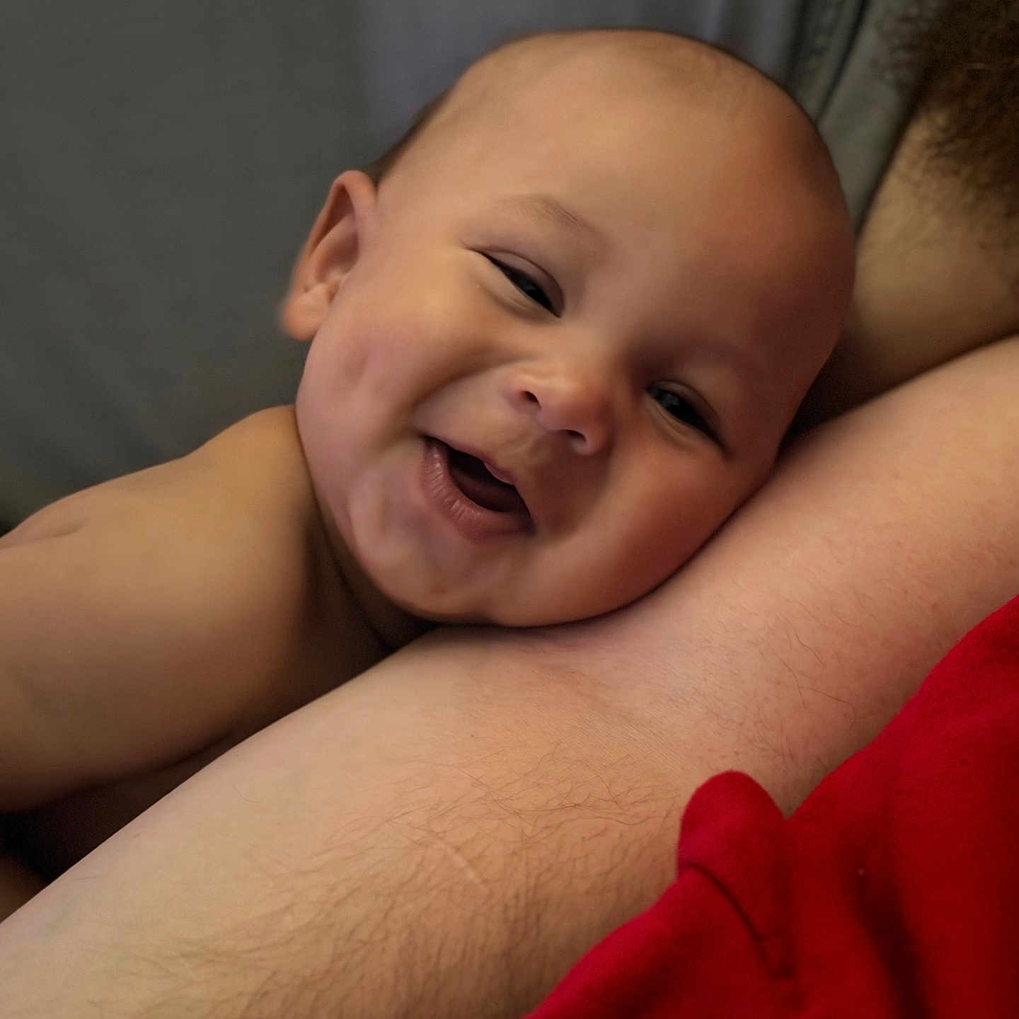Kailo is registered to the contest to win money with this photo: arm, armrest, baby, cheek, child, closeup, cute, dimple, expression, face, happy, human, infant, intimate, person, portrait, resting, skin, smiling, warm