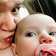 Vyla joined the competition — help win amazing prizes! baby, woman, face, close_up, pacifier, earring, nose_piercing, skin, expression, person, child, indoor, car, window, hair, cute, love, affection, portrait, casual