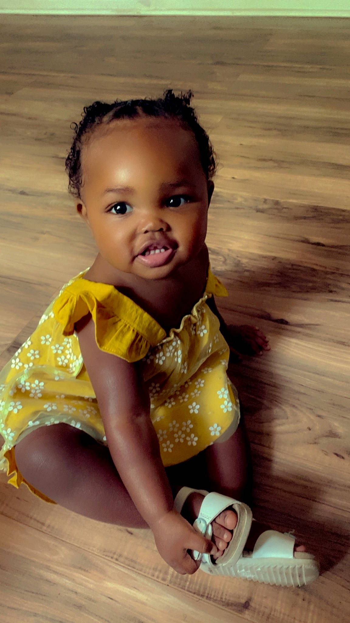 Kalaya is registered to the contest to win money with this photo: arm, baby, baby_toddler_clothing, cheek, child, dress, eye, finger, flash_photography, fun, happy, head, iris, pattern, person, sitting, skin, sleeve, smile, toddler