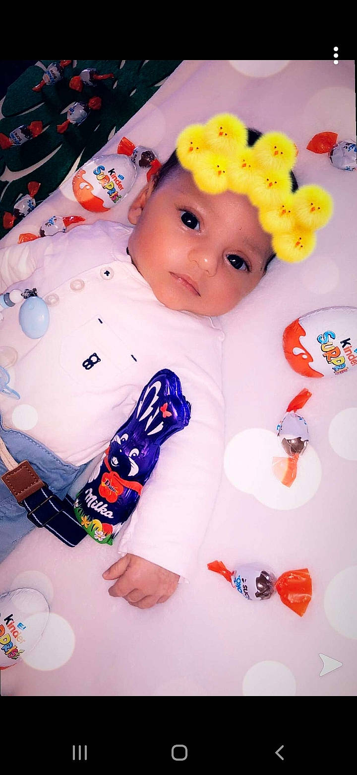 Many a rejoint le concours — aidez-le/la à gagner de superbes lots ! art, baby, baby_products, baby_toddler_clothing, baby_toys, carmine, cheek, child, font, happy, headwear, linens, nail, pattern, person, pink, room, sleeve, t_shirt, toddler