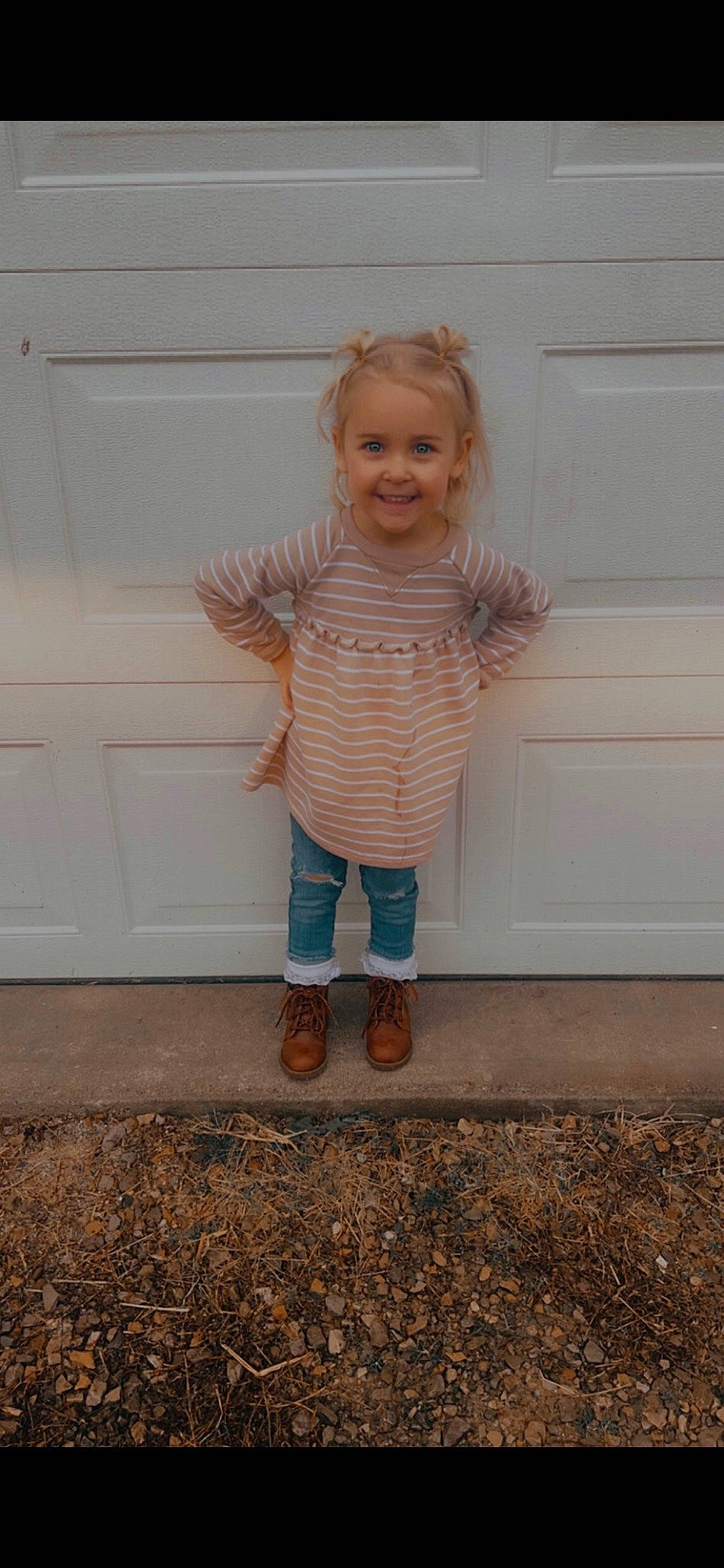 Ryleigh is registered to the contest to win money with this photo: baby, baby_toddler_clothing, child, denim, face, fun, gesture, happy, human_leg, joy, leg, outerwear, pattern, people_in_nature, person, portrait_photography, sitting, sleeve, smile, standing