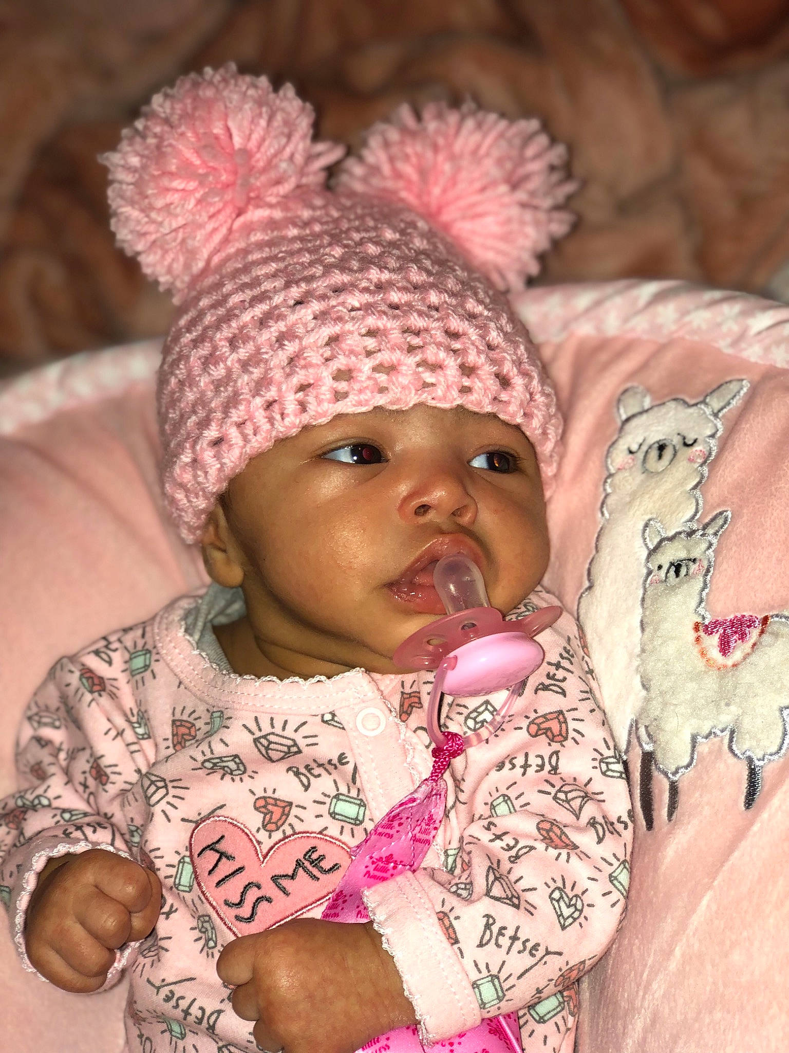 Laylah is registered to the contest to win money with this photo: baby, beanie, bonnet, cap, cheek, child, headgear, headwear, knit_cap, person, pink, toddler