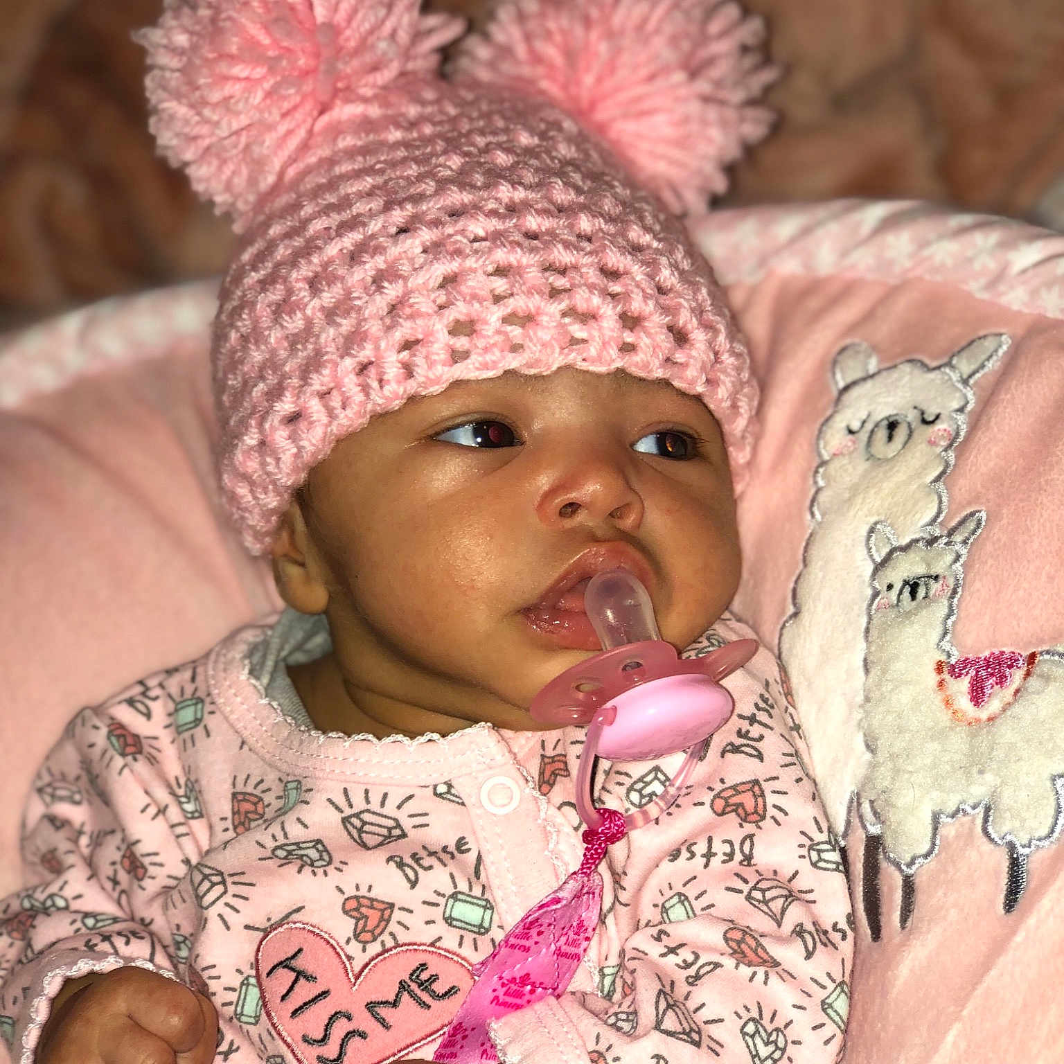Laylah is registered to the contest to win money with this photo: baby, beanie, bonnet, cap, cheek, child, headgear, headwear, knit_cap, person, pink, toddler