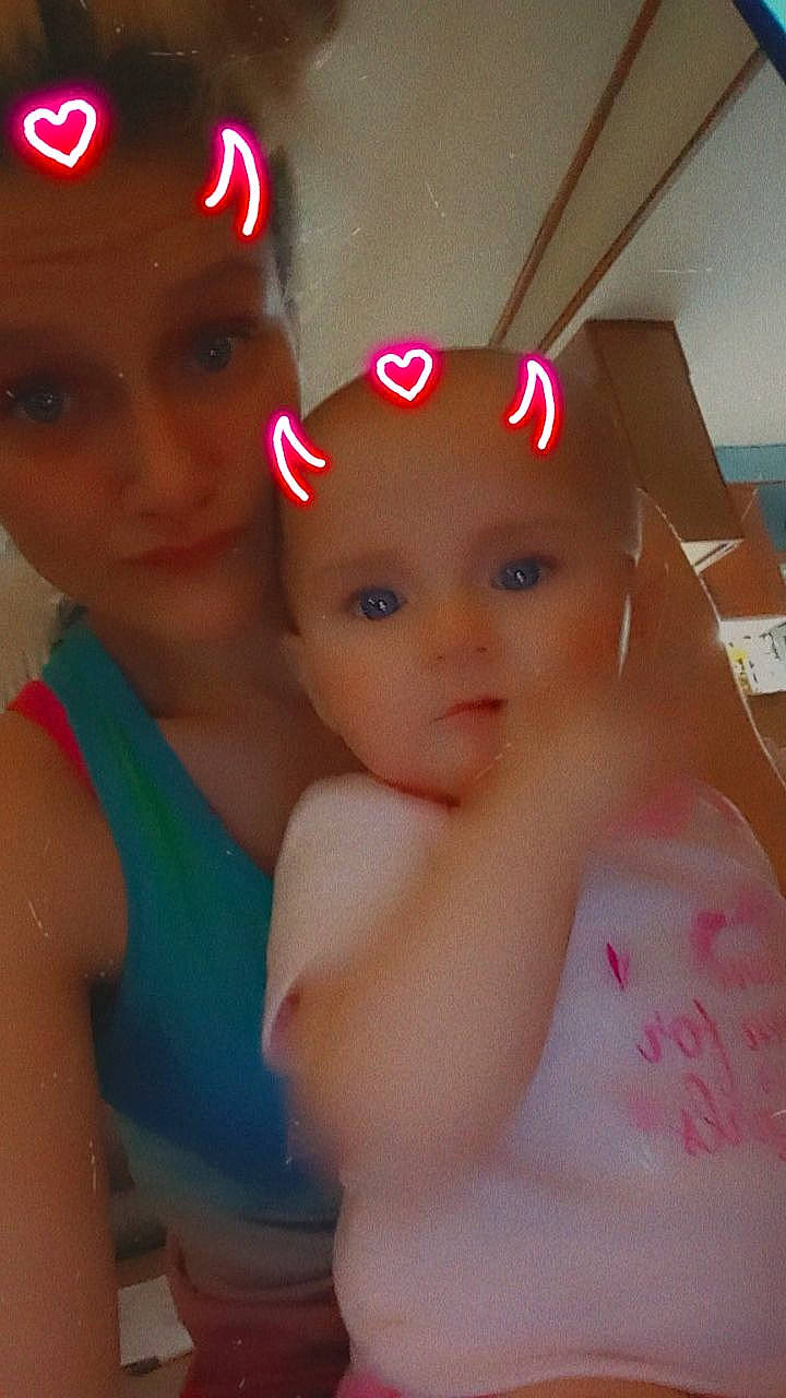 Serenity Ruth is registered to the contest to win money with this photo: baby, baseball_cap, cap, carmine, cheek, child, chin, electric_blue, eyebrow, fashion_accessory, fun, gesture, happy, hat, headgear, lip, magenta, person, personal_protective_equipment, skin