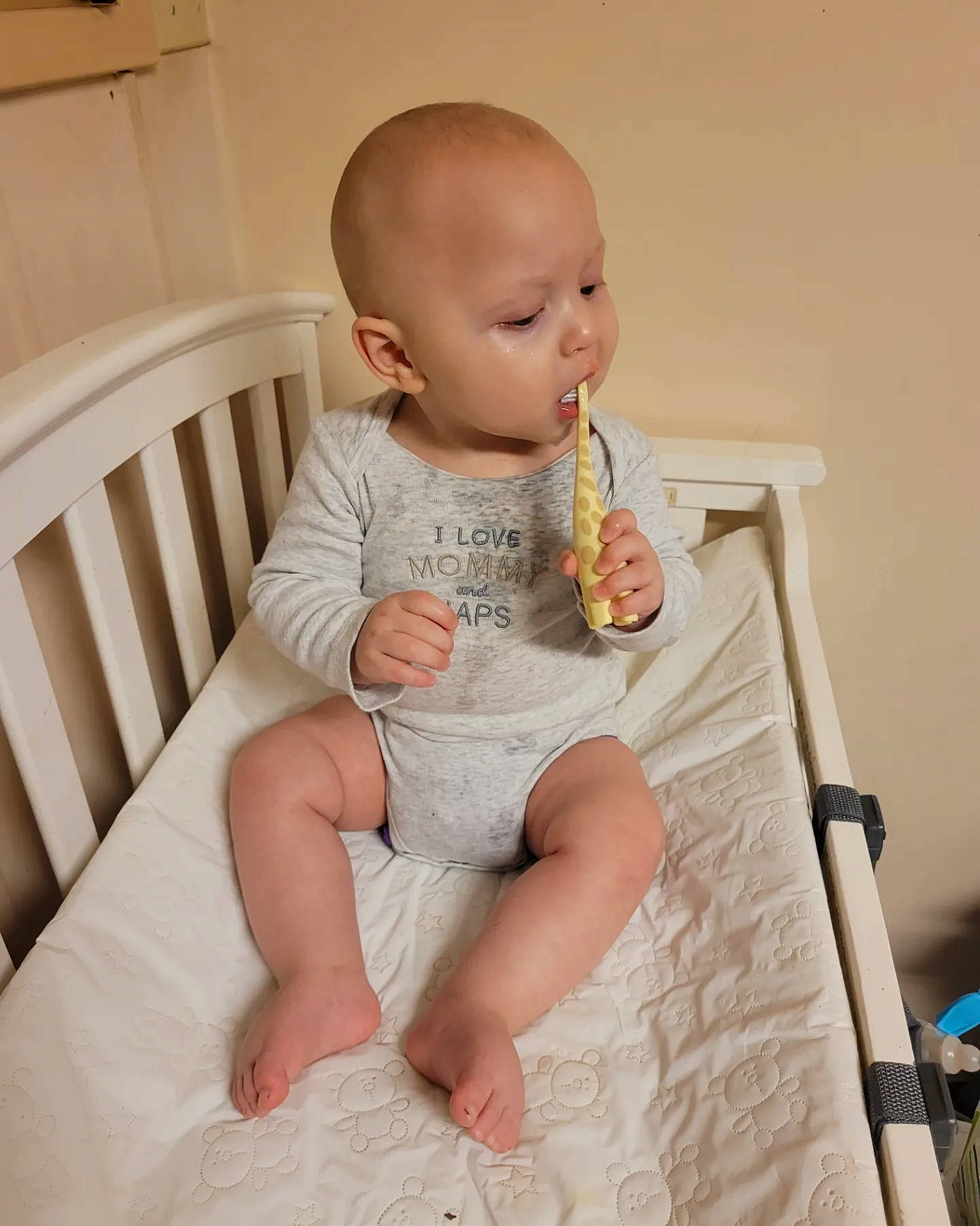 John Michael is registered to the contest to win money with this photo: baby, baby_toddler_clothing, cheek, comfort, elbow, finger, flooring, foot, human_leg, knee, peach, person, room, sitting, skin, sleeve, sock, stomach, thigh, toddler