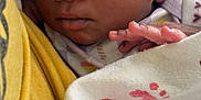 Queen joined the competition — help win amazing prizes! newborn, baby, infant, blanket, footprints, fabric, closeup, face, hand, curious, wrapped, resting, yellow, soft, skin, portrait, child, young, cute, indoors