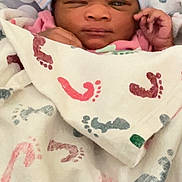 Queen joined the competition — help win amazing prizes! newborn, baby, blanket, footprints, hat, bow, winking, sleeping, cozy, infant, cute, wrapped, pink, blue, striped, soft, portrait, indoors, child, face