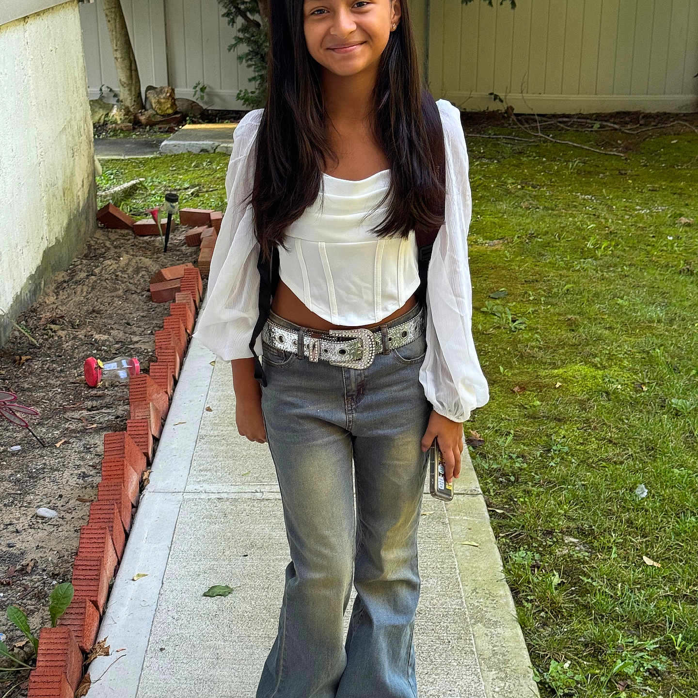 Mia joined the competition — help win amazing prizes! accessories, belt, blackhair, blouse, clothing, coat, face, female, footwear, girl, hair, happy, head, jeans, pants, person, shoe, smile, standing, teen