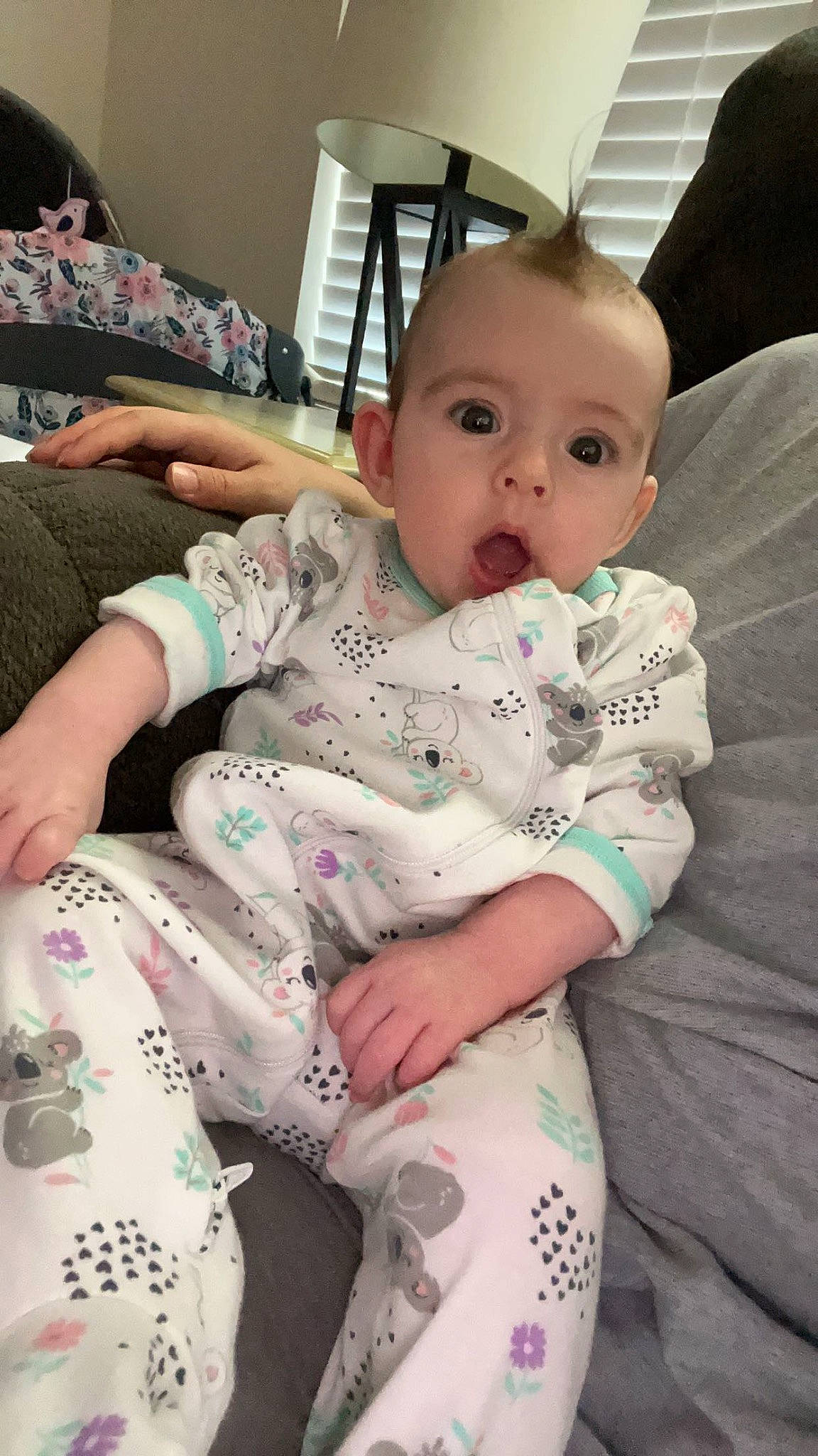 Kinsley joined the competition — help win amazing prizes! baby, baby_toddler_clothing, cheek, child, comfort, couch, finger, foot, head, lap, linens, pattern, person, sitting, skin, sleeve, surprise, t_shirt, textile, thigh