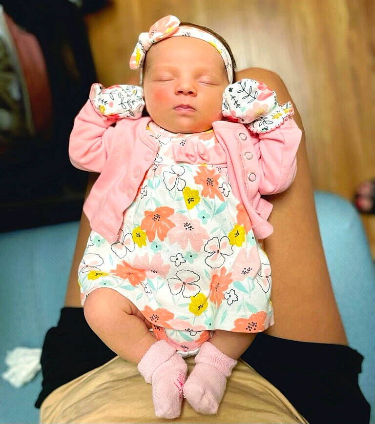 Annalise joined the competition — help win amazing prizes! baby, baby_toddler_clothing, cheek, child, dress, event, eye, fun, happy, head, headgear, leisure, magenta, pattern, peach, person, pink, sitting, skin, sleeve