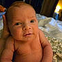 Rhett is registered to the contest to win money with this photo: baby, infant, face, skin, hand, naked, newborn, portrait, eyes, expression, person, human, child, cute, warm, indoors, bed, blanket, soft, light