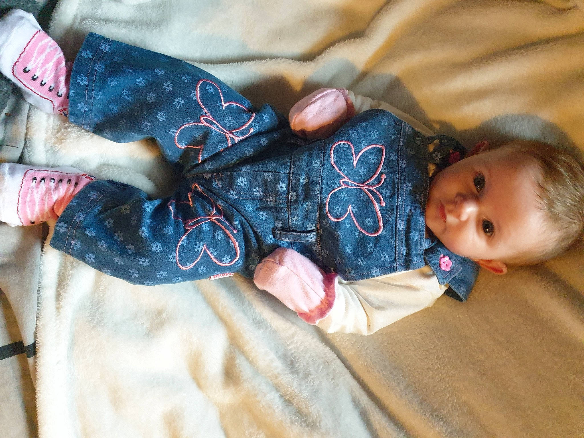 Darcy joined the competition — help win amazing prizes! baby, baby_toddler_clothing, child, comfort, couch, elbow, eye, gesture, head, human_body, joint, linens, nail, pattern, person, sitting, skin, sleeve, toddler, wood