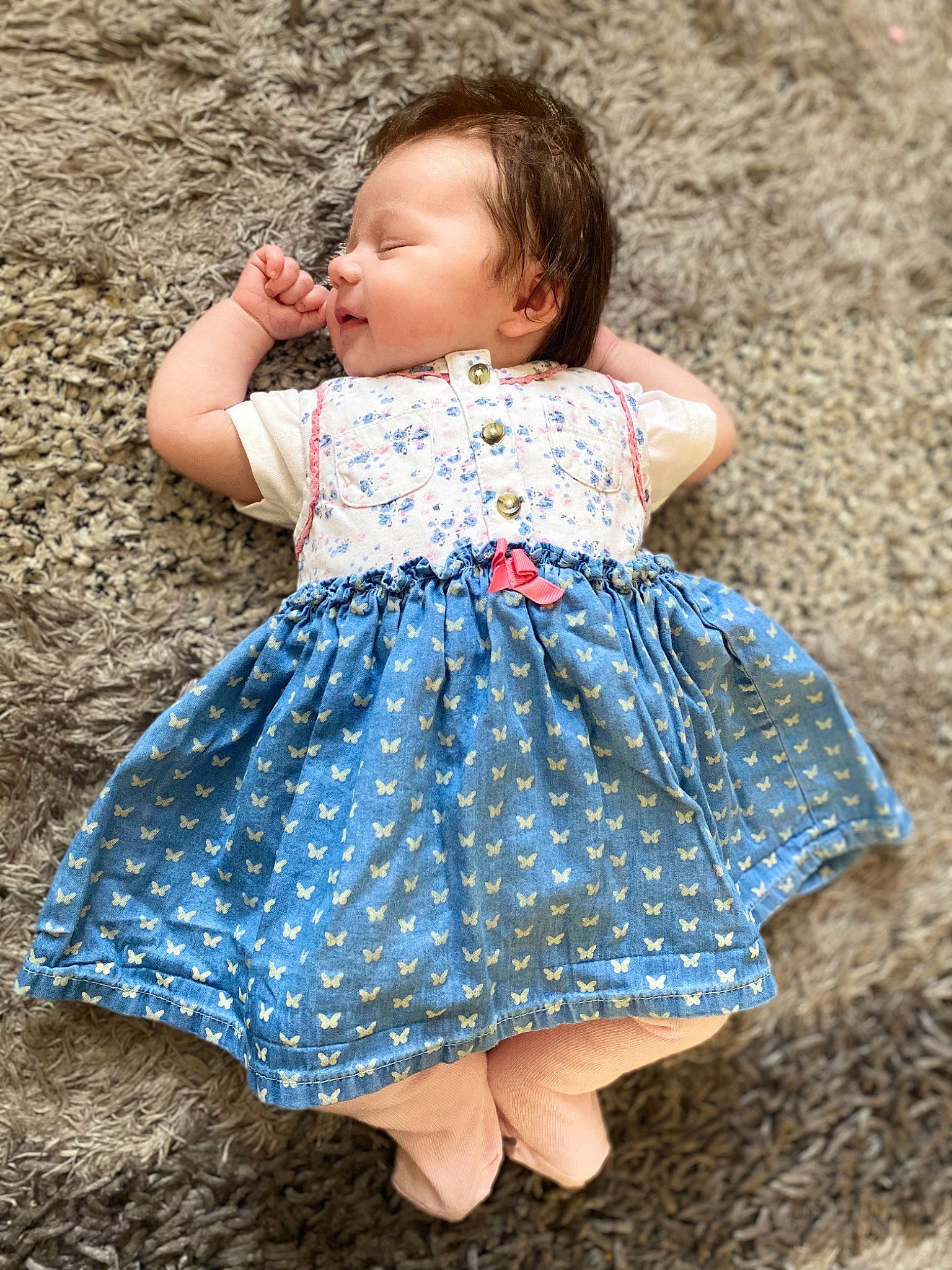 Penelope-jade is registered to the contest to win money with this photo: azure, baby_toddler_clothing, child, day_dress, dress, eye, face, grass, happy, head, human_body, iris, pattern, people_in_nature, person, shoulder, skin, sleeve, textile, toddler