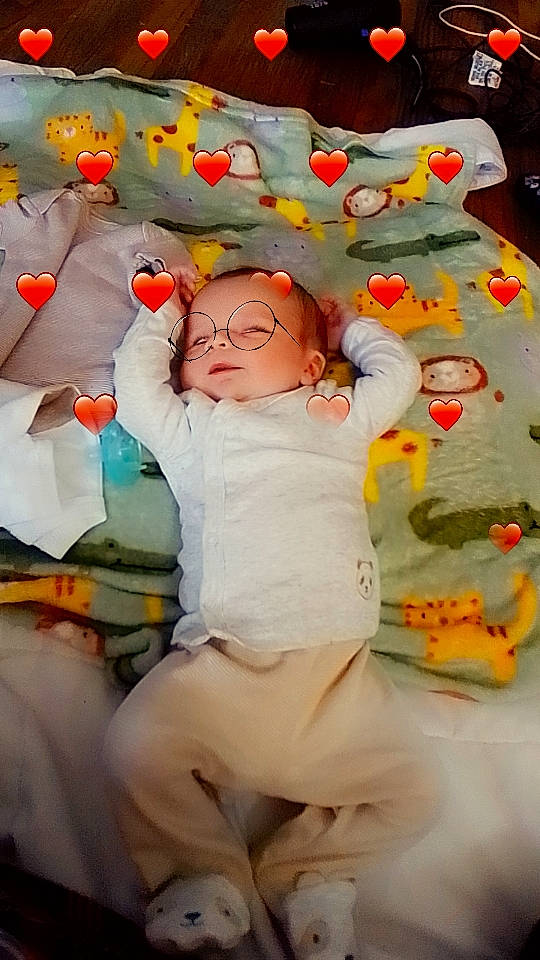 Giovanni joined the competition — help win amazing prizes! baby, baby_products, bed_sheet, bedding, child, comfort, event, fun, happy, leisure, linens, pattern, person, play, room, sitting, smile, toddler