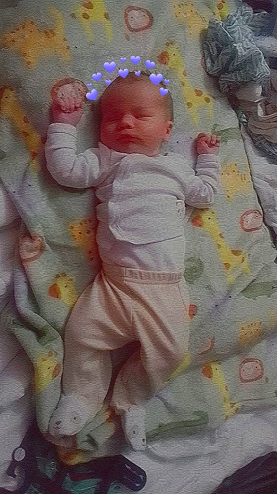 Giovanni is registered to the contest to win money with this photo: art, baby, baby_products, baby_safety, baby_sleeping, baby_toddler_clothing, cheek, child, comfort, face, head, illustration, linens, pattern, person, pink, product, room, skin, textile