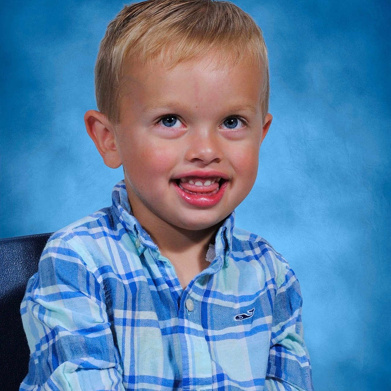 Austin is registered to the contest to win money with this photo: accessories, blonde, bodypart, boy, child, clothing, face, formalwear, hair, happy, head, male, mouth, person, photography, portrait, shirt, sitting, smile, teeth