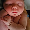 baby, newborn, sleeping, arms, chubby_cheeks, skin, person, hand, closeup, infant, peaceful, resting, portrait, human, soft_lighting, cute, child, newborn_baby, toddler, sleep
