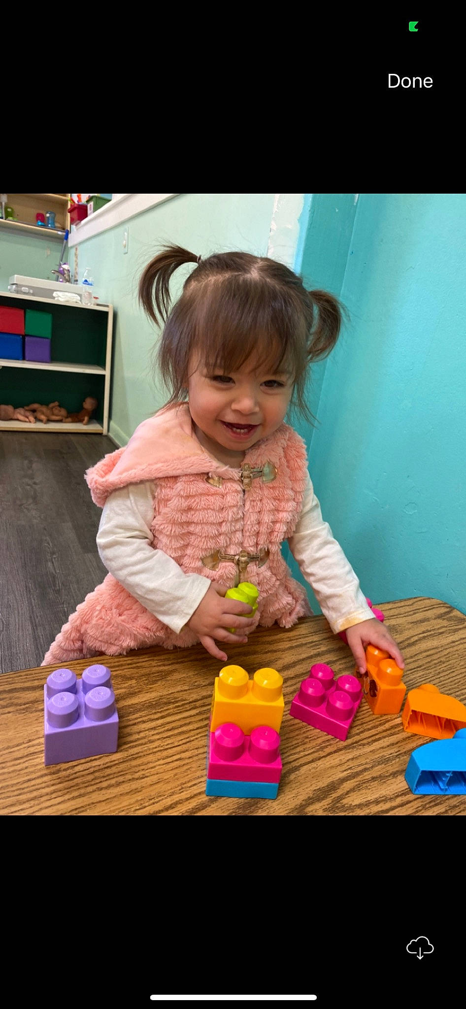 Kaylani is registered to the contest to win money with this photo: baby, child, dress, event, fun, happy, magenta, person, pink, play, purple, room, shelf, sitting, smile, snapshot, table, toddler, toy, toy_block