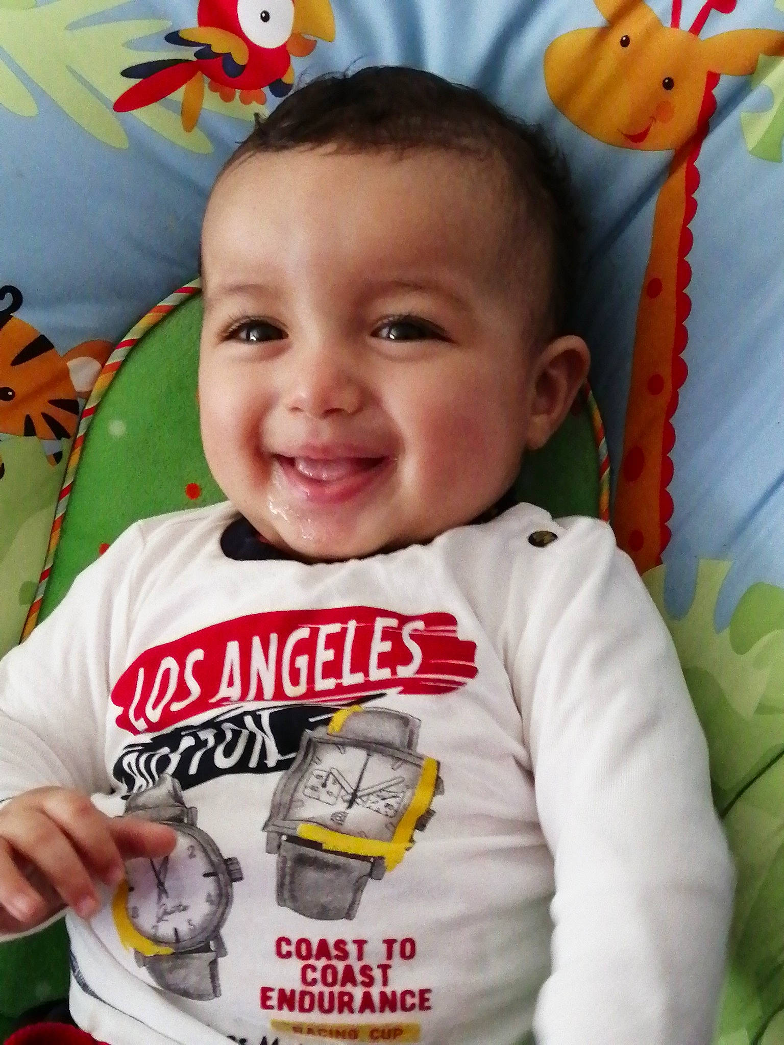 Ibrahim participe au concours pour gagner de l'argent avec cette photo : baby_toddler_clothing, cheek, eye, facial_expression, finger, happy, head, joy, mammal, nose, orange, organ, outerwear, person, product, skin, sleeve, smile, textile, vertebrate