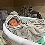 Kazan joined the competition — help win amazing prizes! baby, towel, hood, bathtub, kitchen, countertop, newborn, infant, wrapped, face, eyes, appliance, electric_kettle, coffee_maker, cabinet, soft_texture, blanket, home, indoor, curious