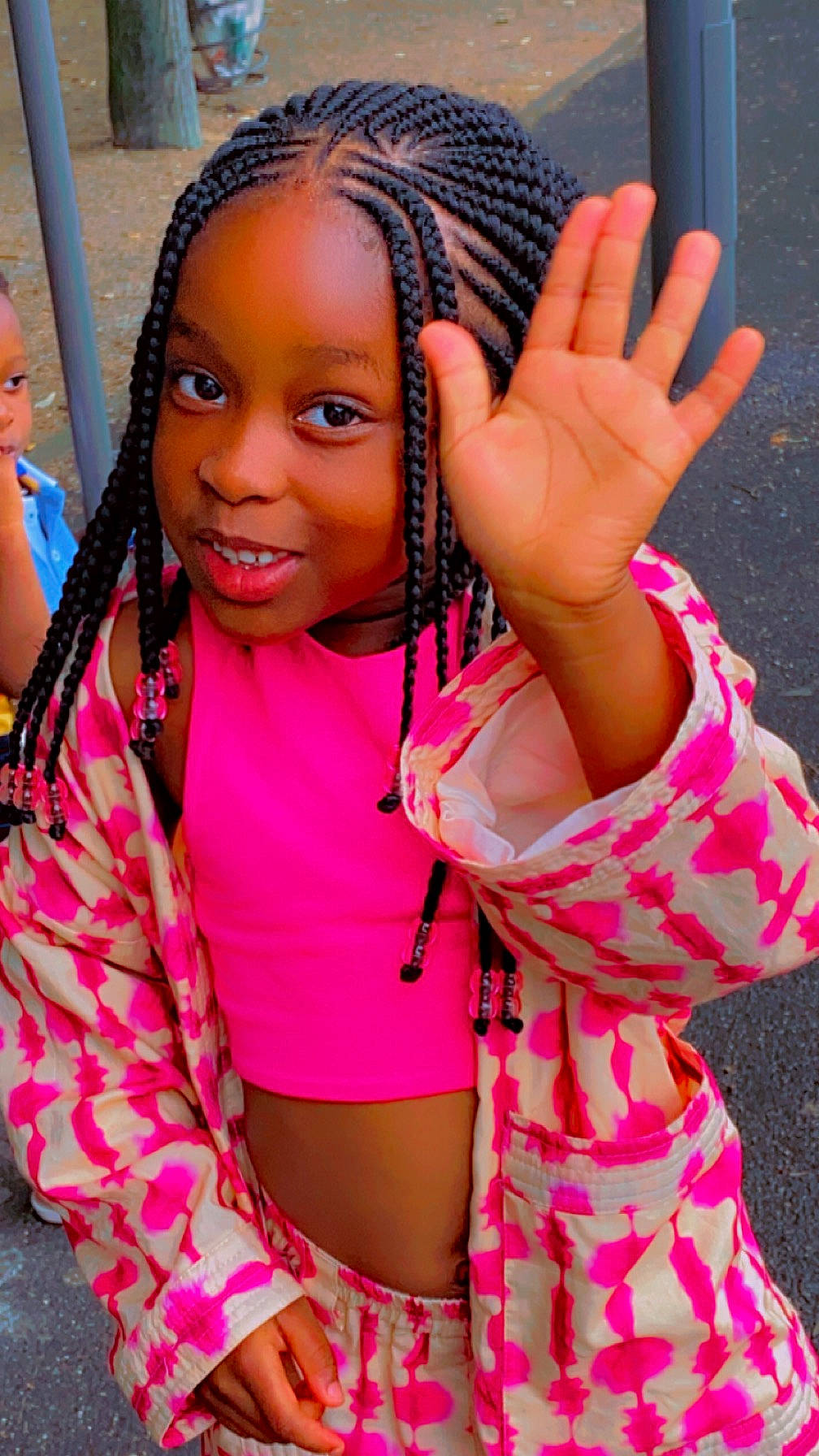 Aminata participe au concours pour gagner de l'argent avec cette photo : beauty, black_hair, child, cornrows, face, finger, fun, gesture, hairstyle, happy, joy, leisure, long_hair, magenta, organ, person, pink, skin, smile, thigh