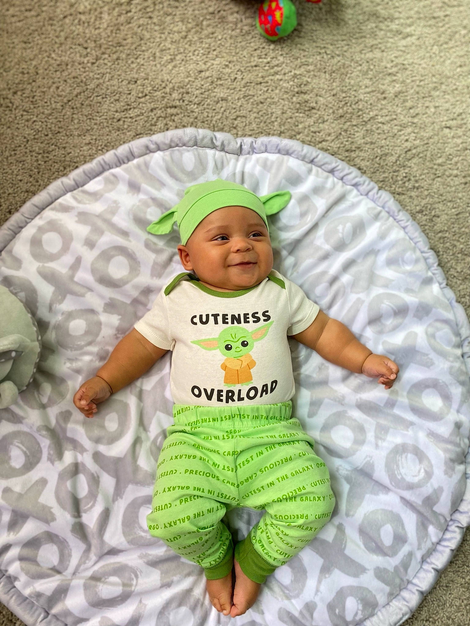 Achilles joined the competition — help win amazing prizes! baby, baby_products, baby_toddler_clothing, child, circle, comfort, fun, grass, green, happy, hat, headwear, joy, linens, pattern, person, play, product, sleeve, smile
